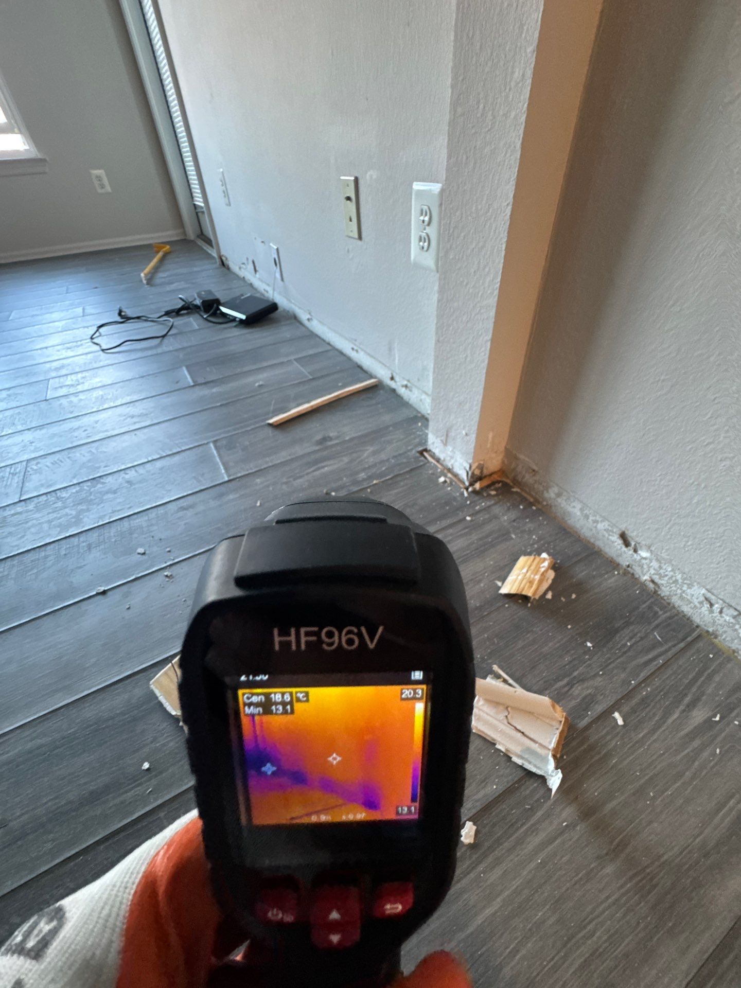 Dehumidifier and air handling equipment operating during drying phase of mold remediation in McLean home.