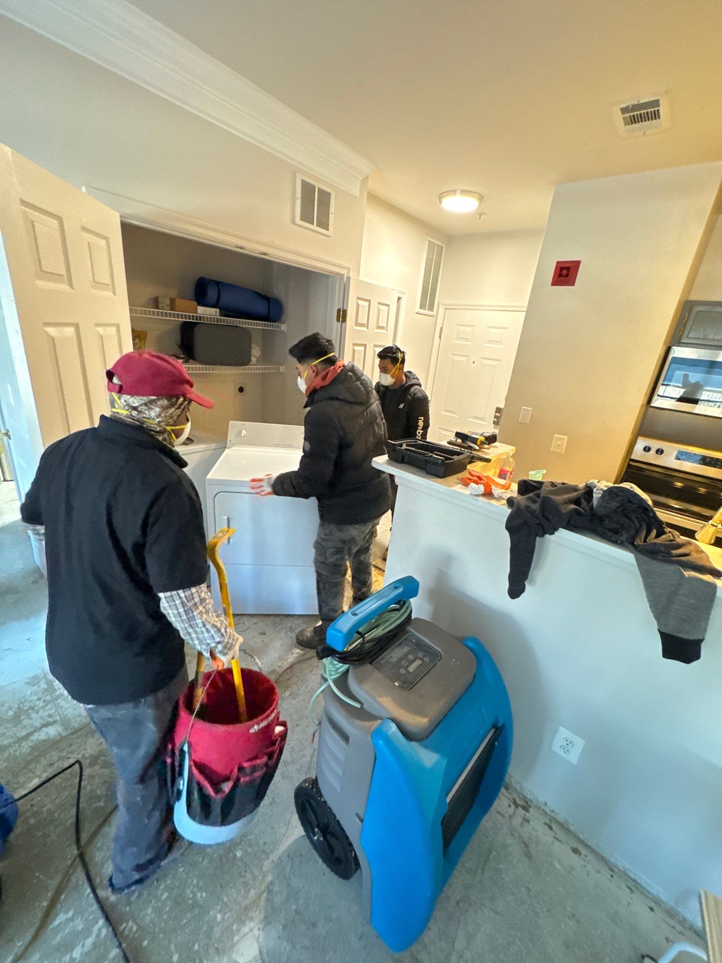 Mold remediation setup in McLean with dehumidification equipment positioned for moisture control during initial assessment.