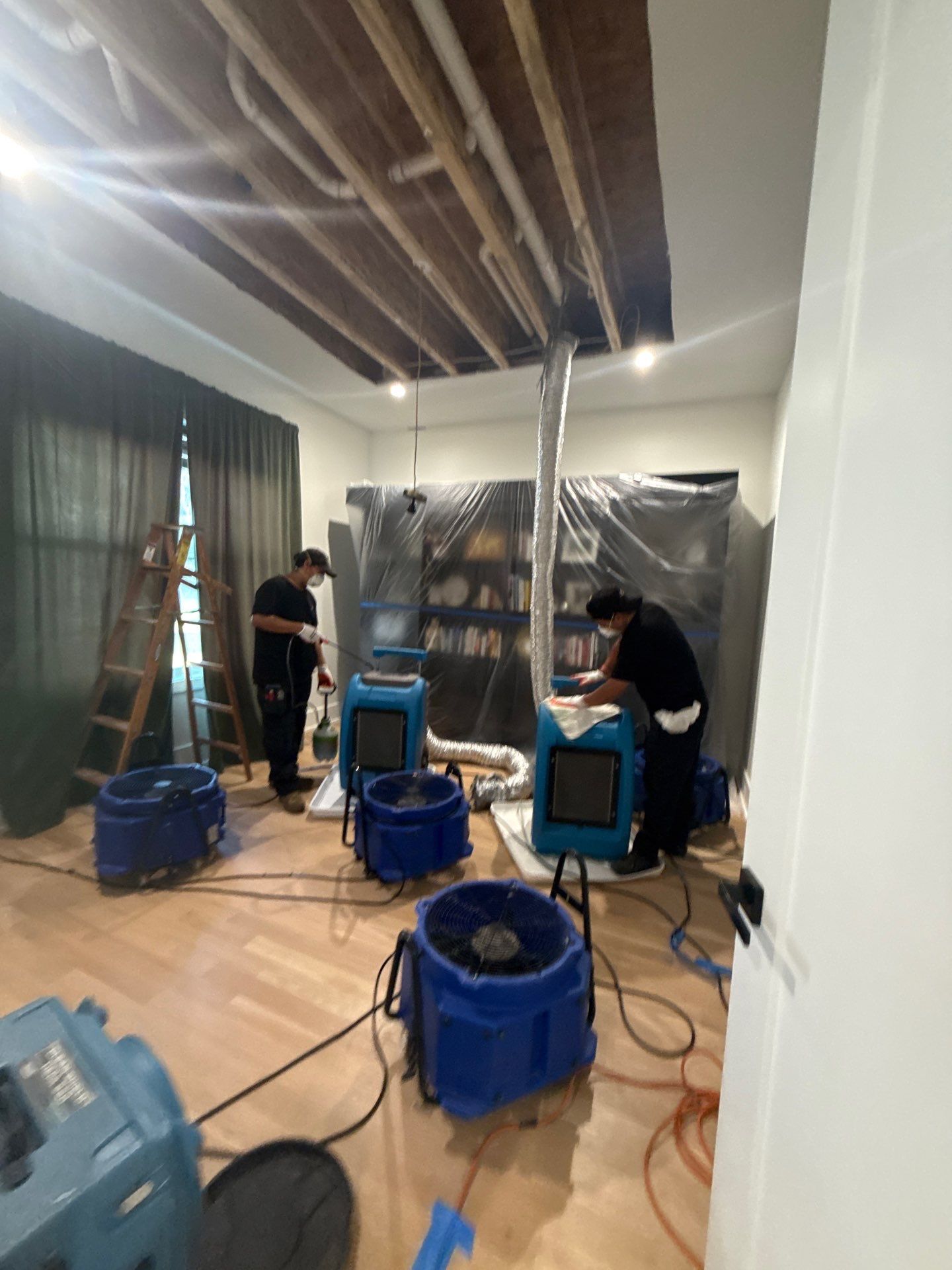 Equipment configuration during structural drying phase of water damage restoration process.