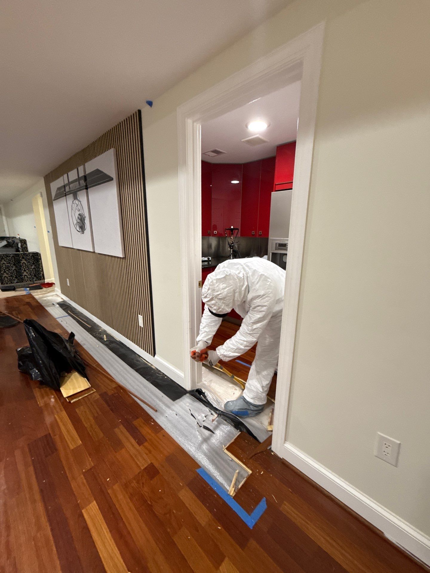 Continued drying and dehumidification of structural materials in water restoration work.