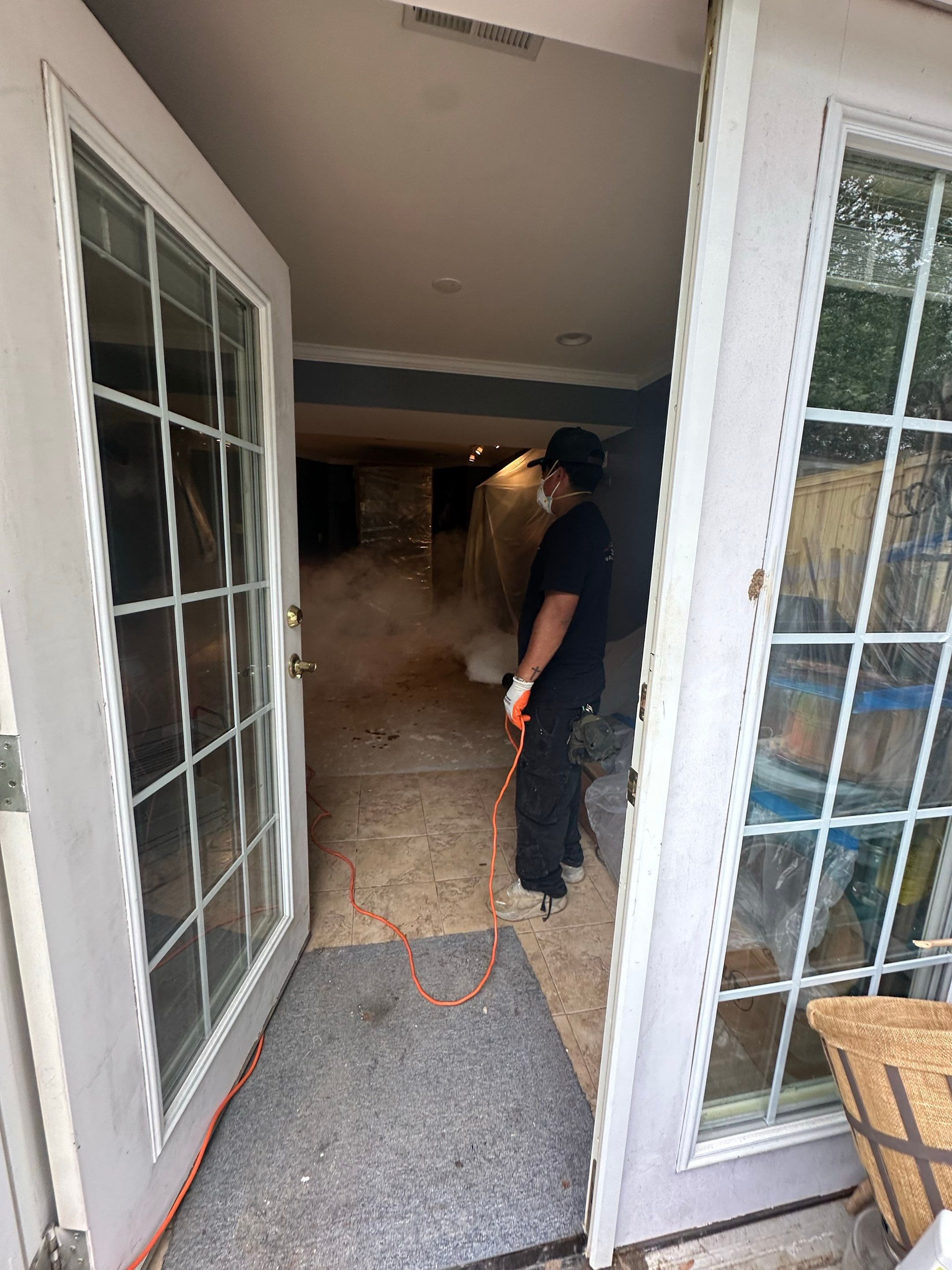Final stage of water damage restoration in Woodbridge showing dried structural areas ready for flooring replacement.