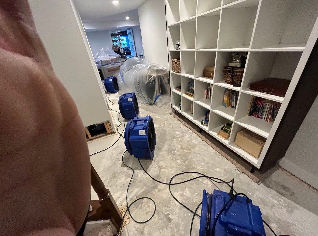 Mold remediation in Falls Church: dehumidification equipment positioned for structural drying after contamination discovery.