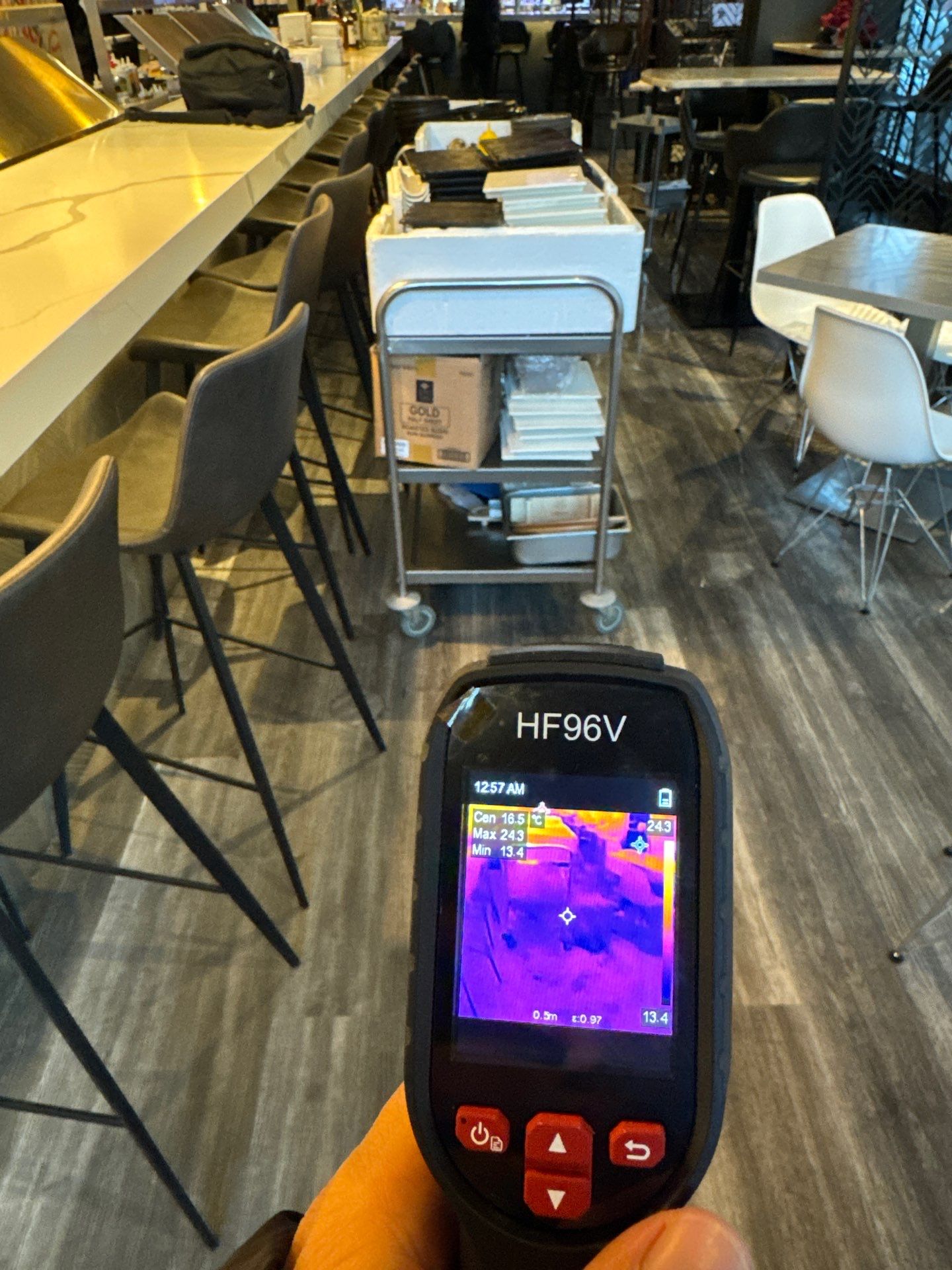 Infrared scan identifying hidden moisture zones within wall cavity during restoration inspection.