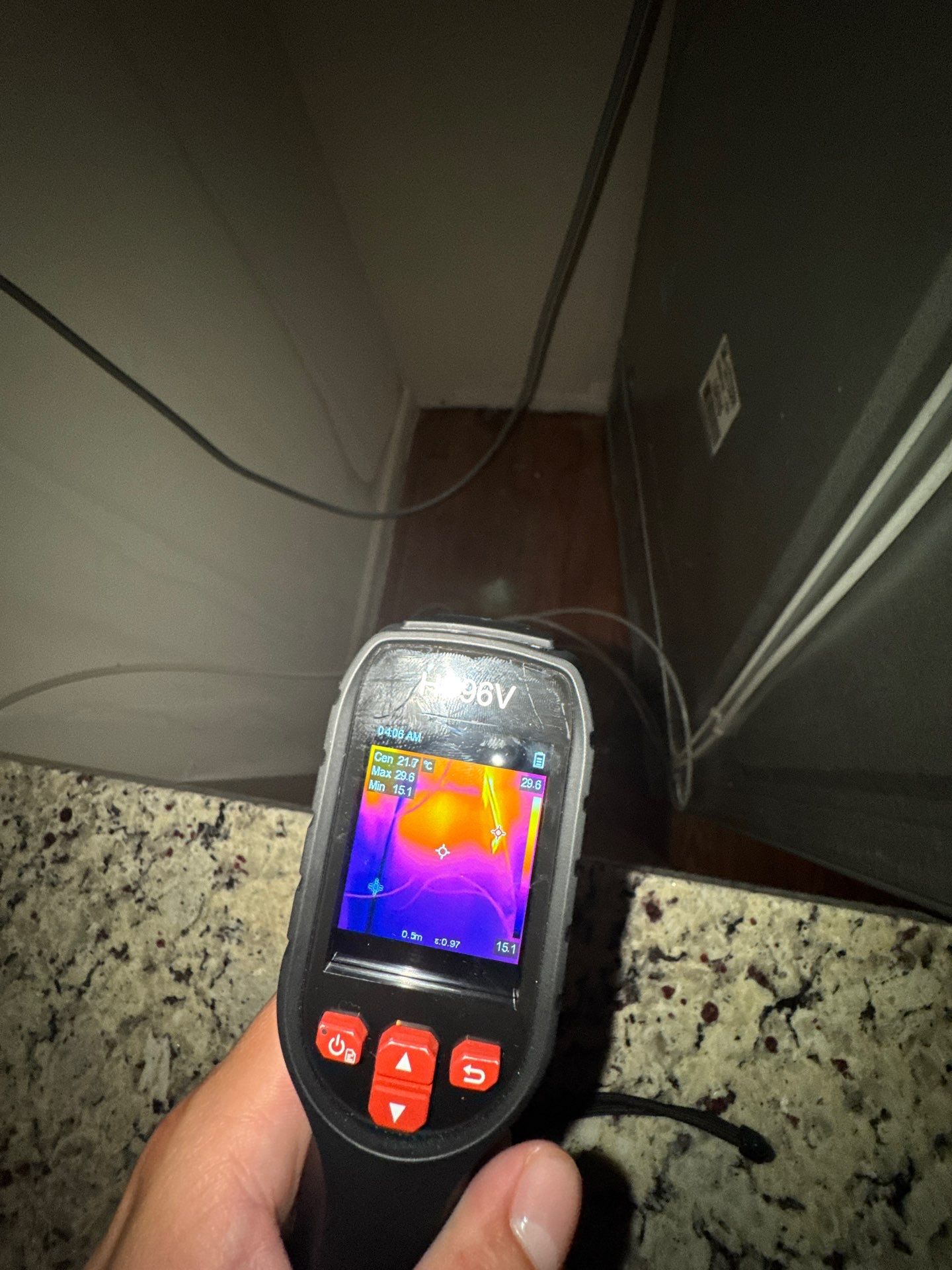 Final drying stage with thermal imaging confirming moisture remediation completion.