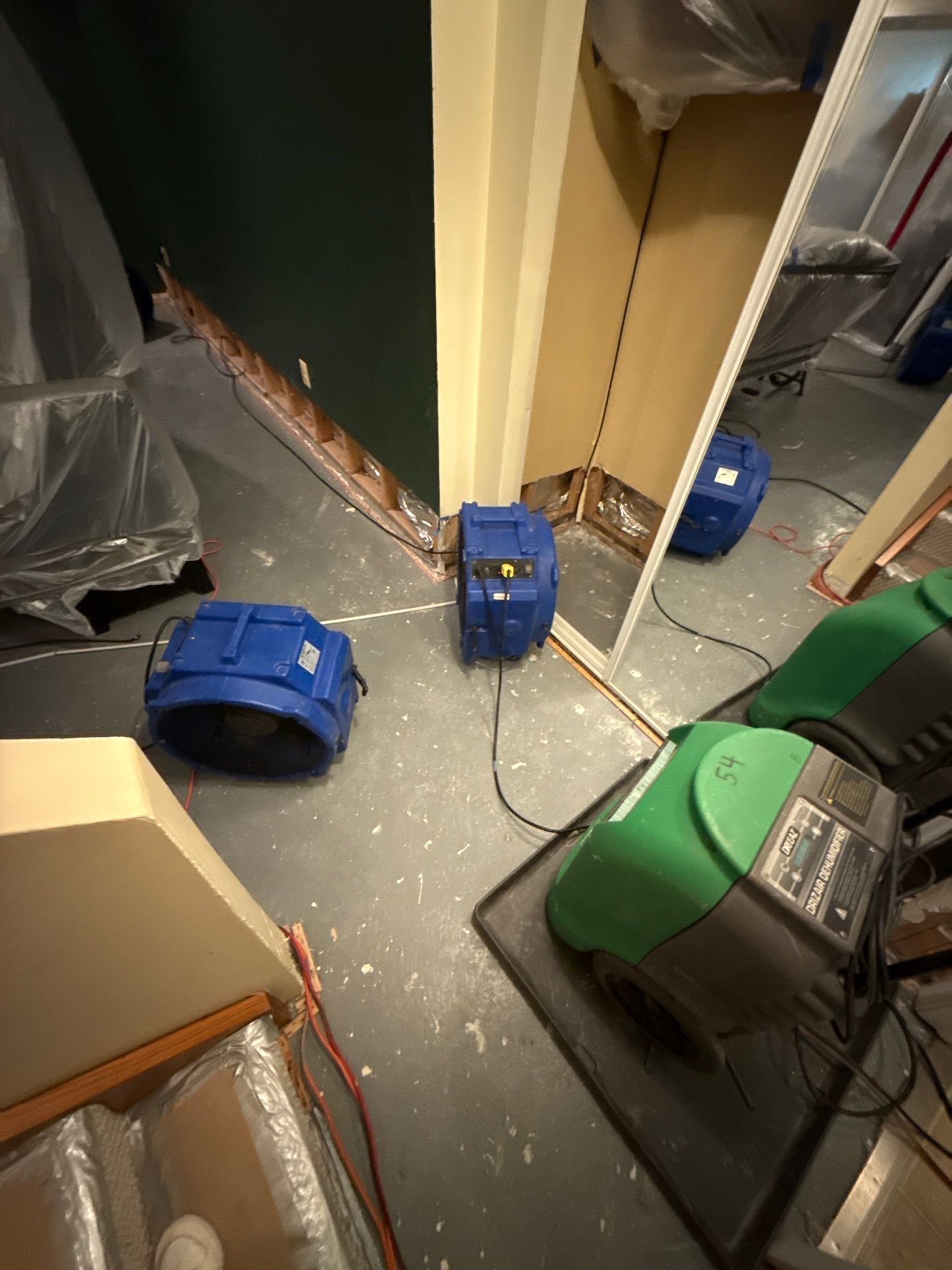 Rebuilt wall section installed and ready for finishing, completing the water damage restoration process.