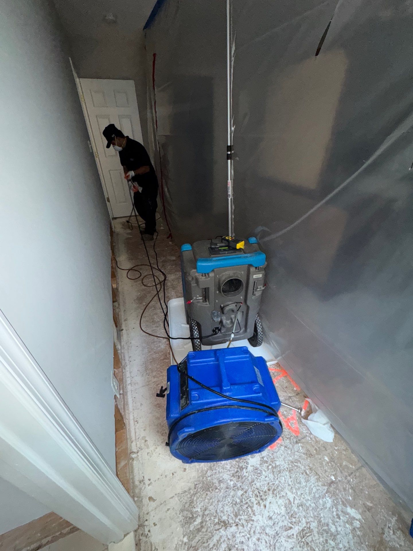 Standing water fills a Chantilly home's interior during initial water damage assessment and extraction.