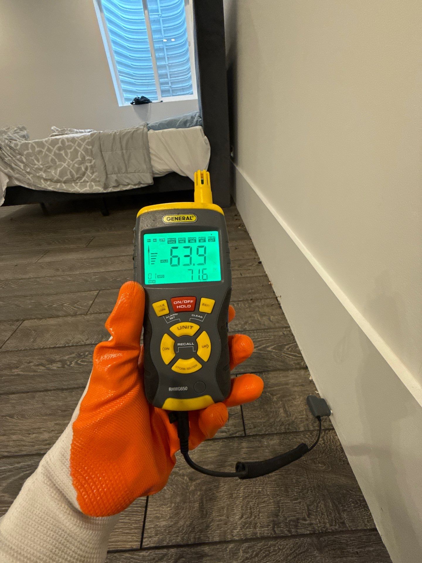 Dehumidifiers and air movers positioned during mid-stage remediation to extract moisture from affected materials.