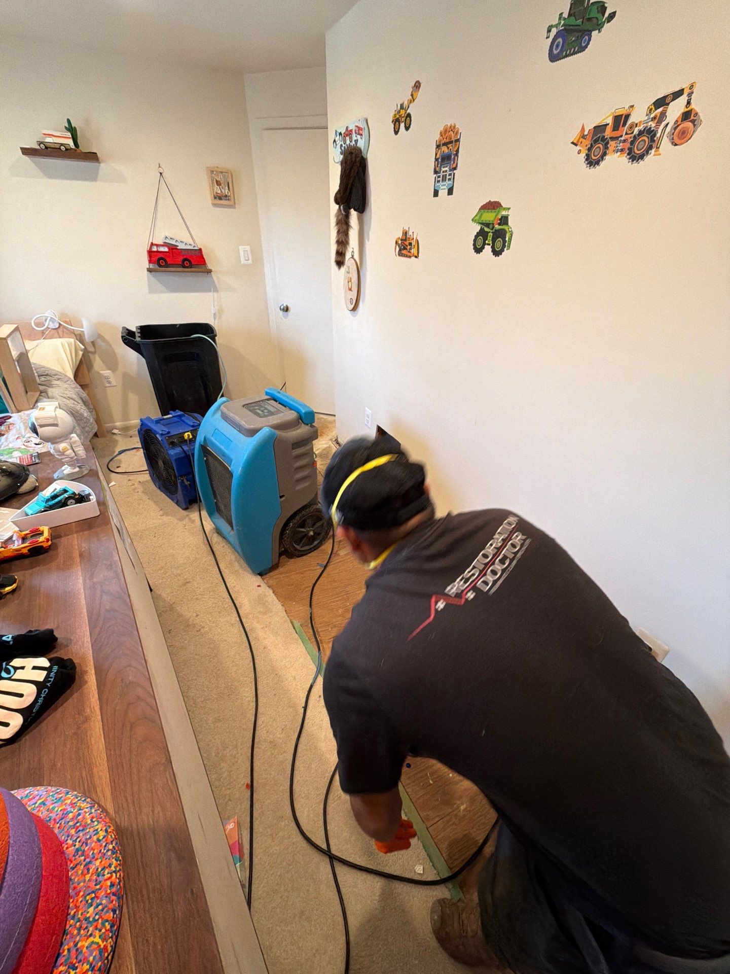 Structural drying setup with dehumidification equipment positioned for moisture removal.