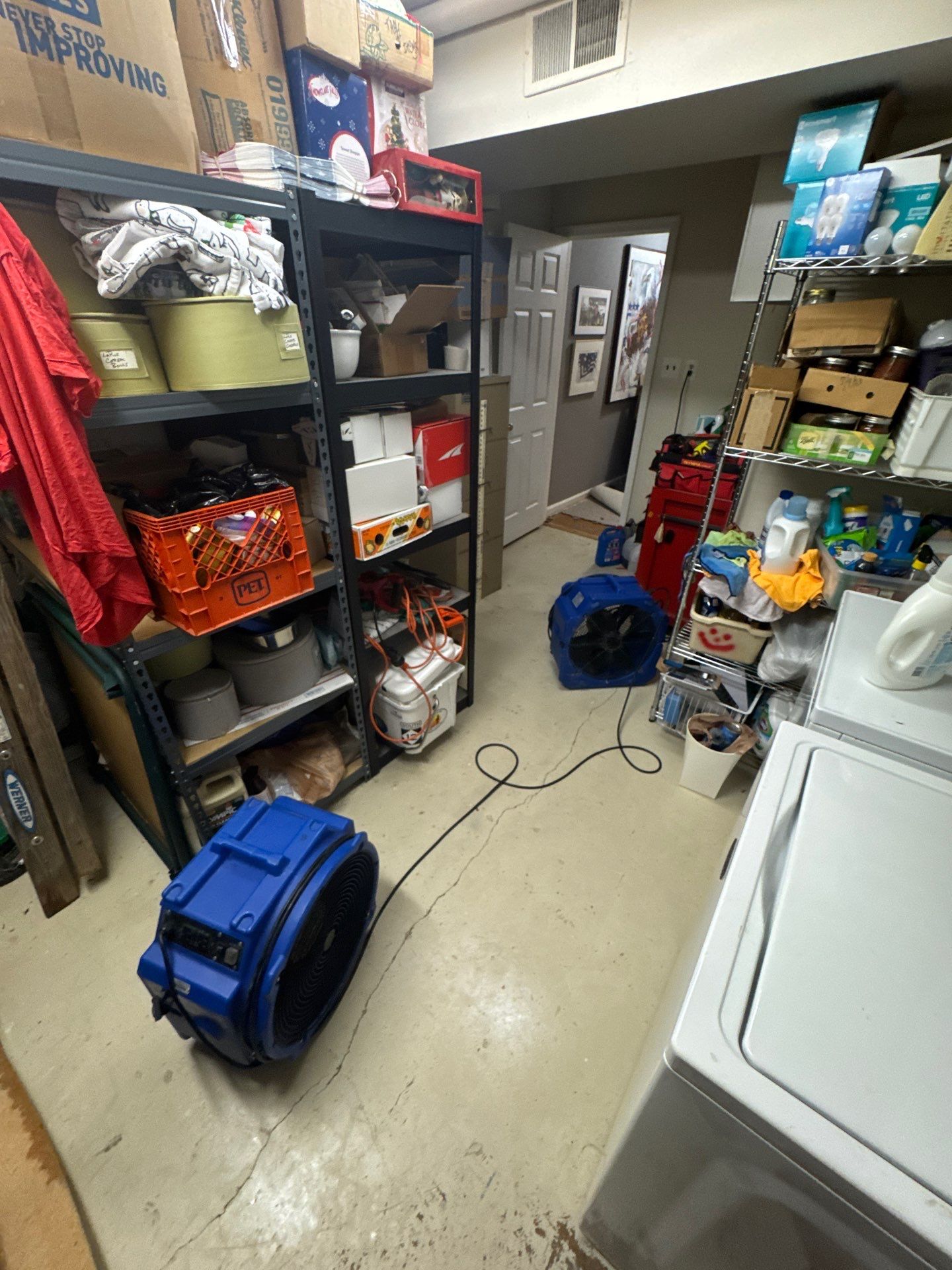Dehumidification and air handling equipment operating within mold remediation containment, Reston.
