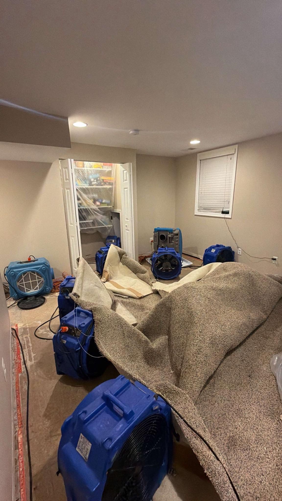 Containment barrier removed after successful structural drying and flooring remediation in Alexandria.
