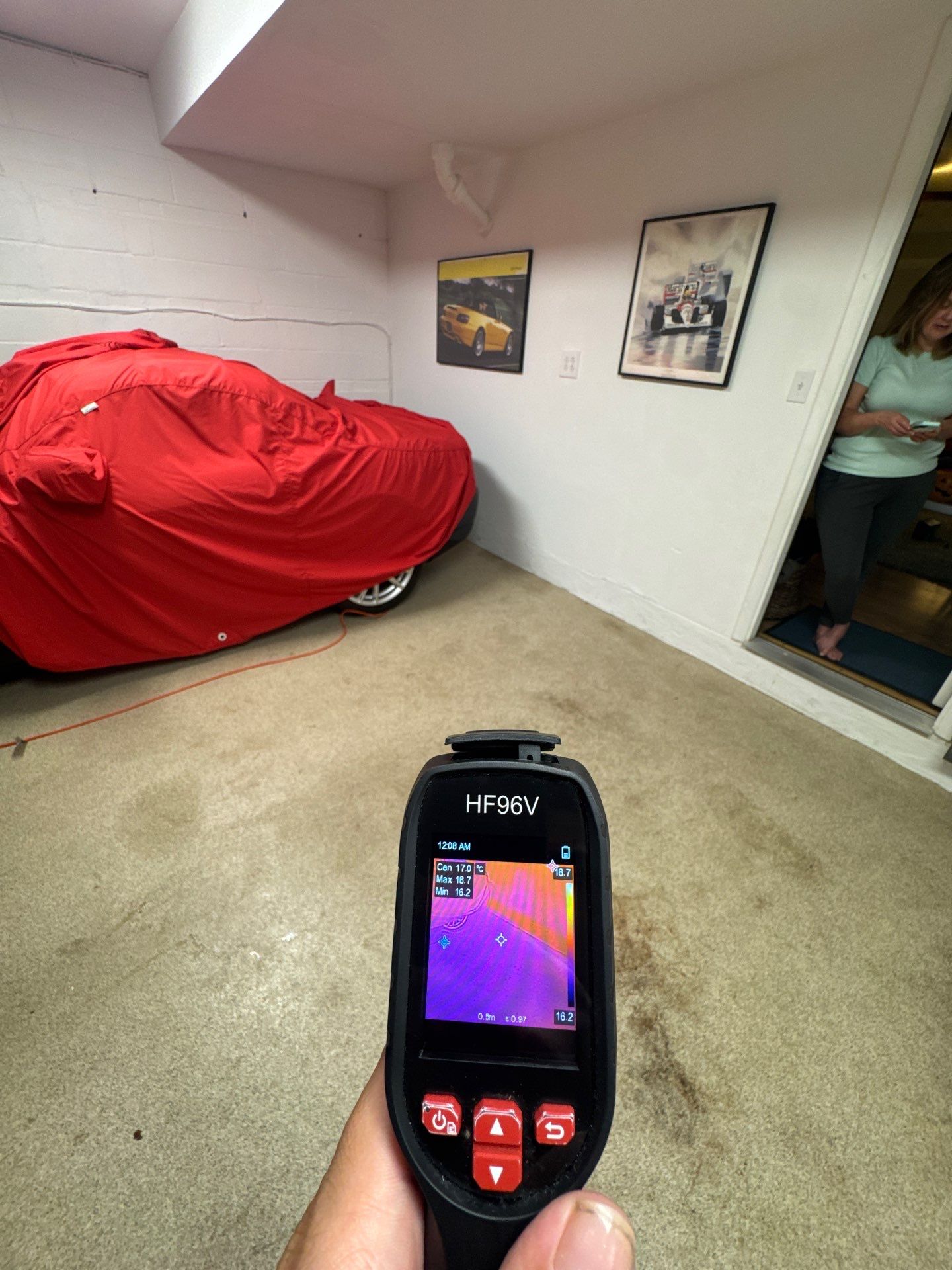 Moisture mapping in progress, thermal imaging revealing hidden water intrusion across building materials.