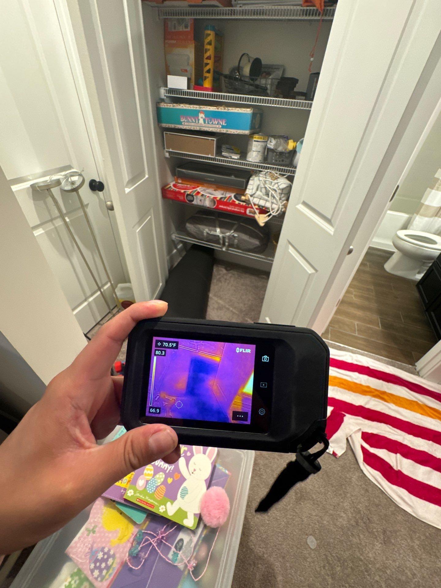Containment barrier and thermal imaging setup during water damage assessment in Dumfries.