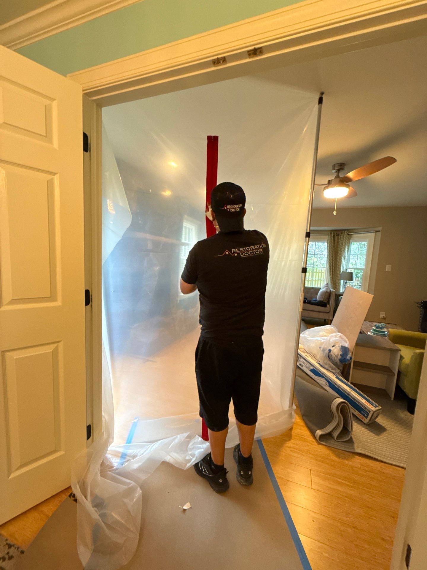 Dehumidification equipment positioned within containment to manage moisture during remediation.