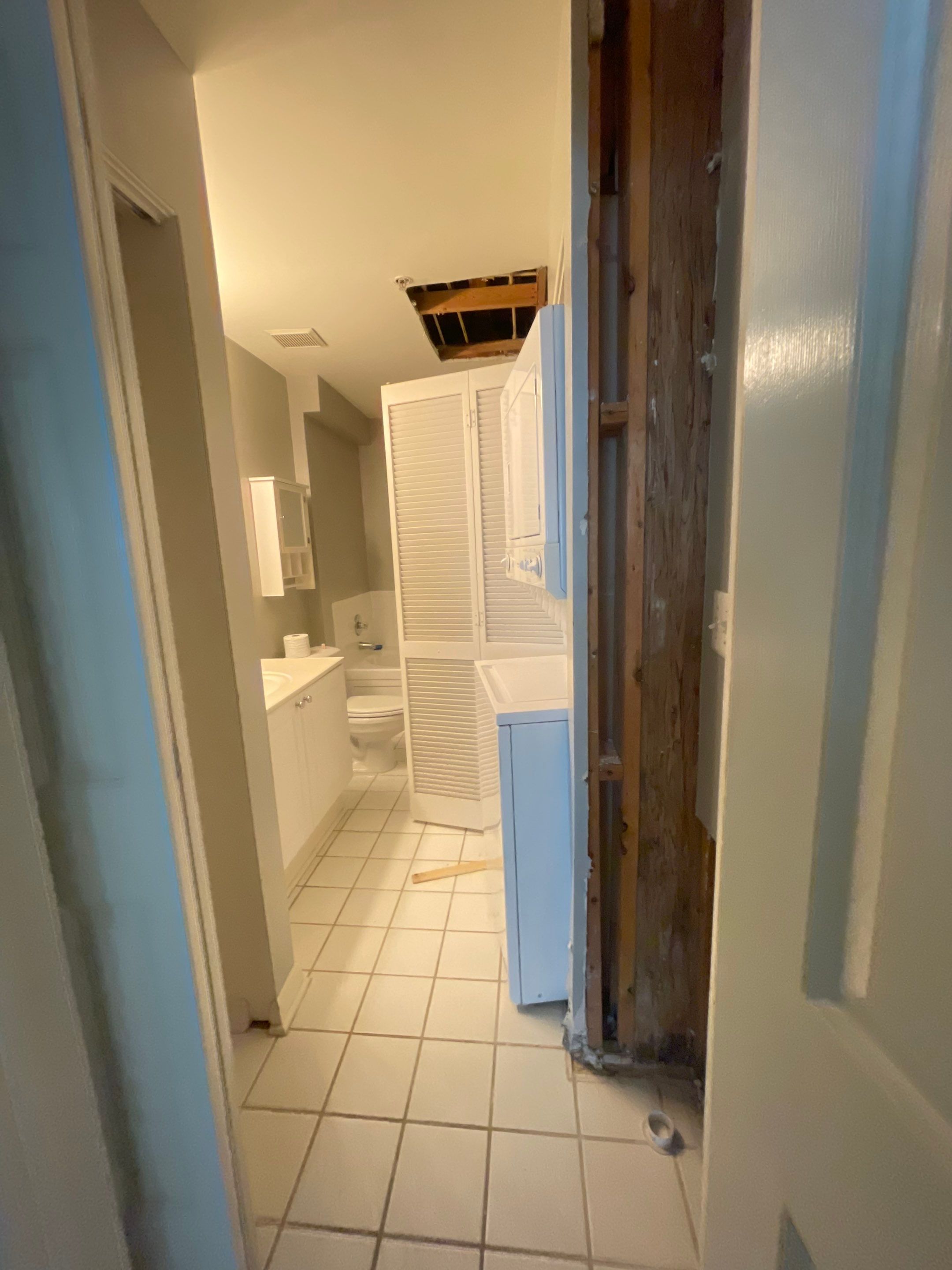 Final stage of Vienna water damage restoration showing completed wall replacement and structural drying verification.