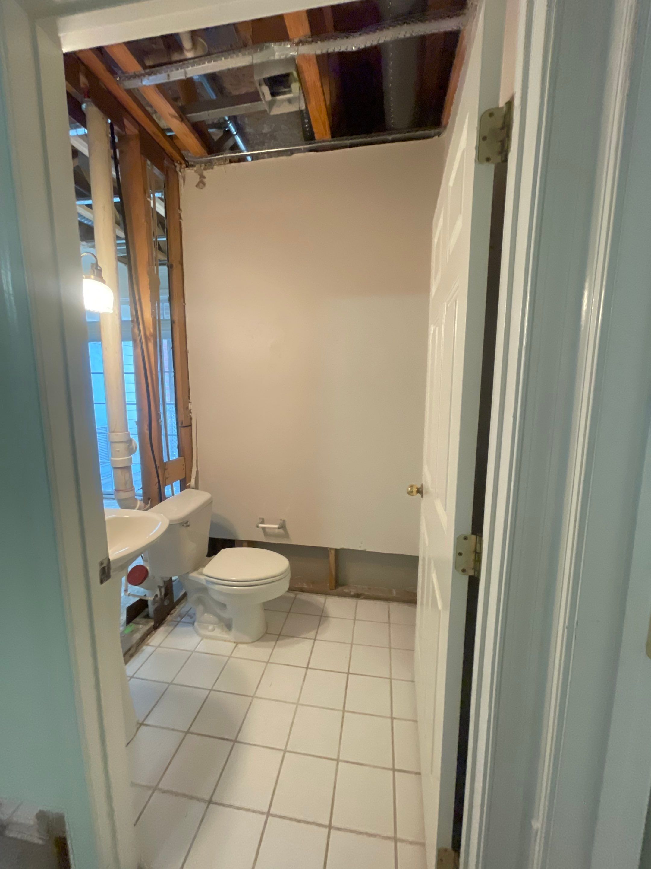Vienna water damage restoration in progress, structural drying underway with equipment monitoring moisture levels in walls.