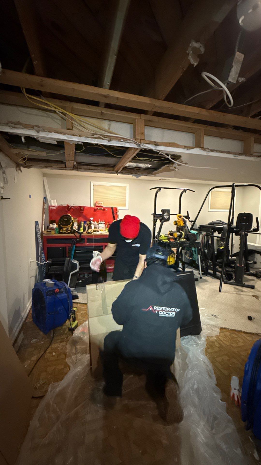 Containment and drying equipment deployed to manage water damage scope.