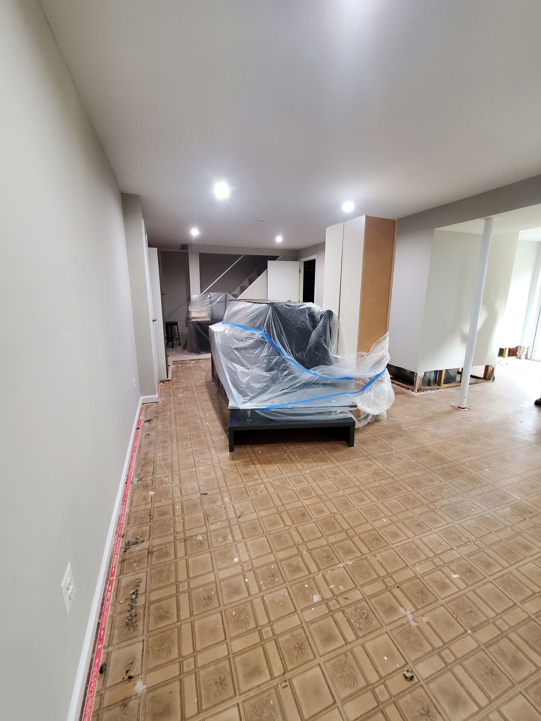 Mid-stage structural drying in Sterling water damage job, dehumidification equipment operating in place.