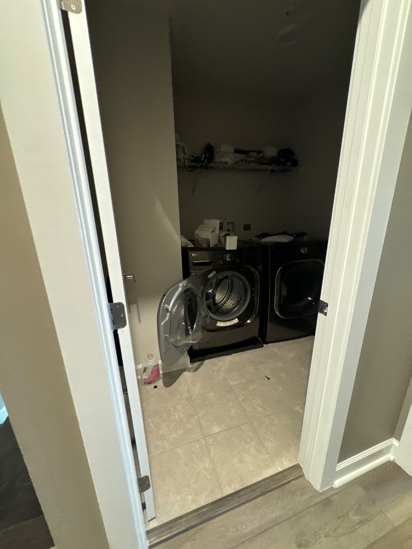Containment barrier and dehumidifier in place during active drying phase of water damage mitigation.