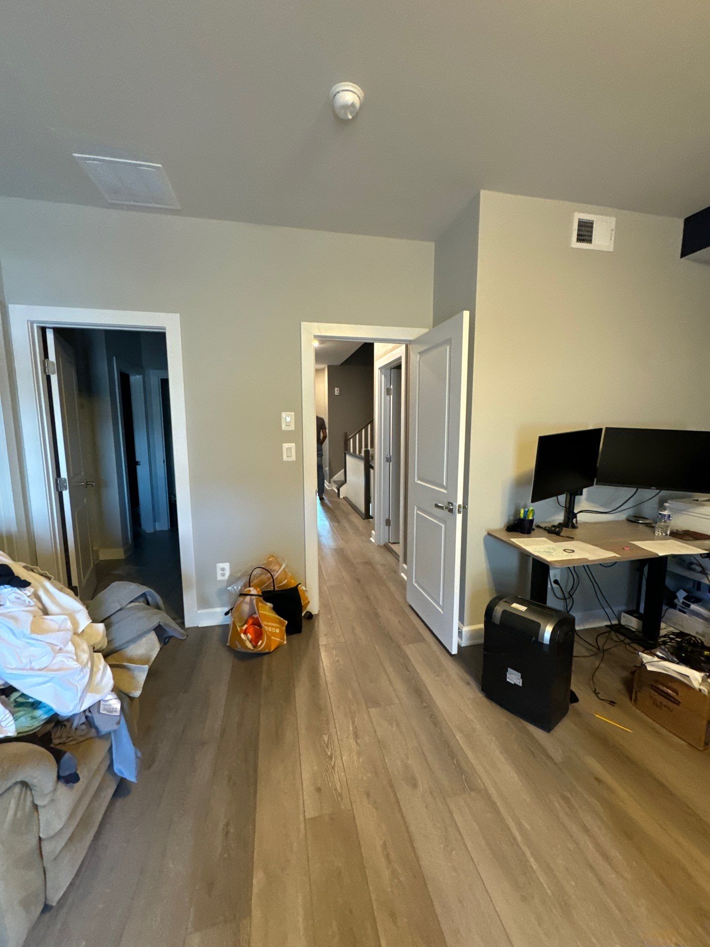 Containment barrier installed during water damage restoration in Ashburn, with thermal imaging equipment positioned for moisture mapping.