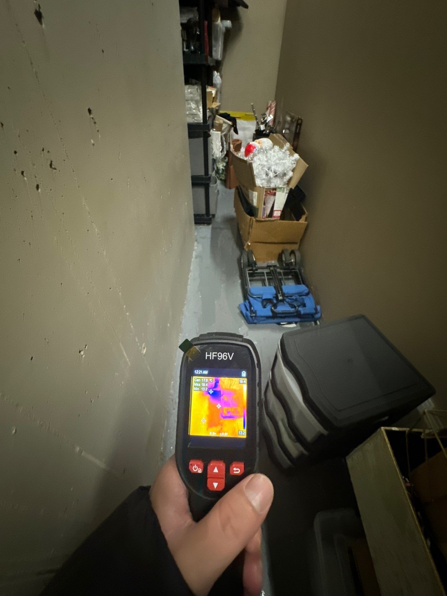 Initial water damage assessment in Arlington showing affected contents staged for protection and inventory.