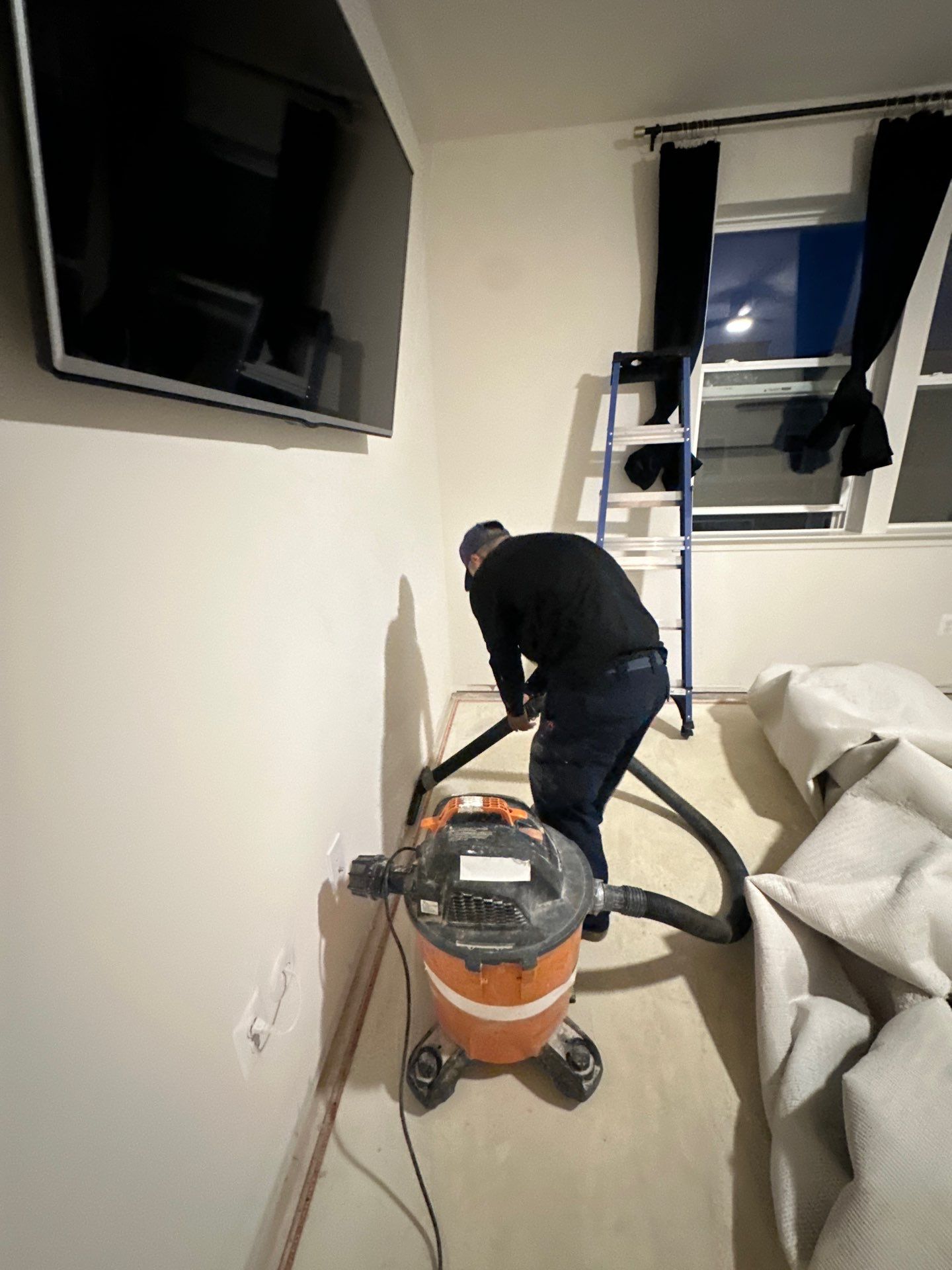 Wet drywall marked for removal during water damage restoration assessment in Woodbridge.