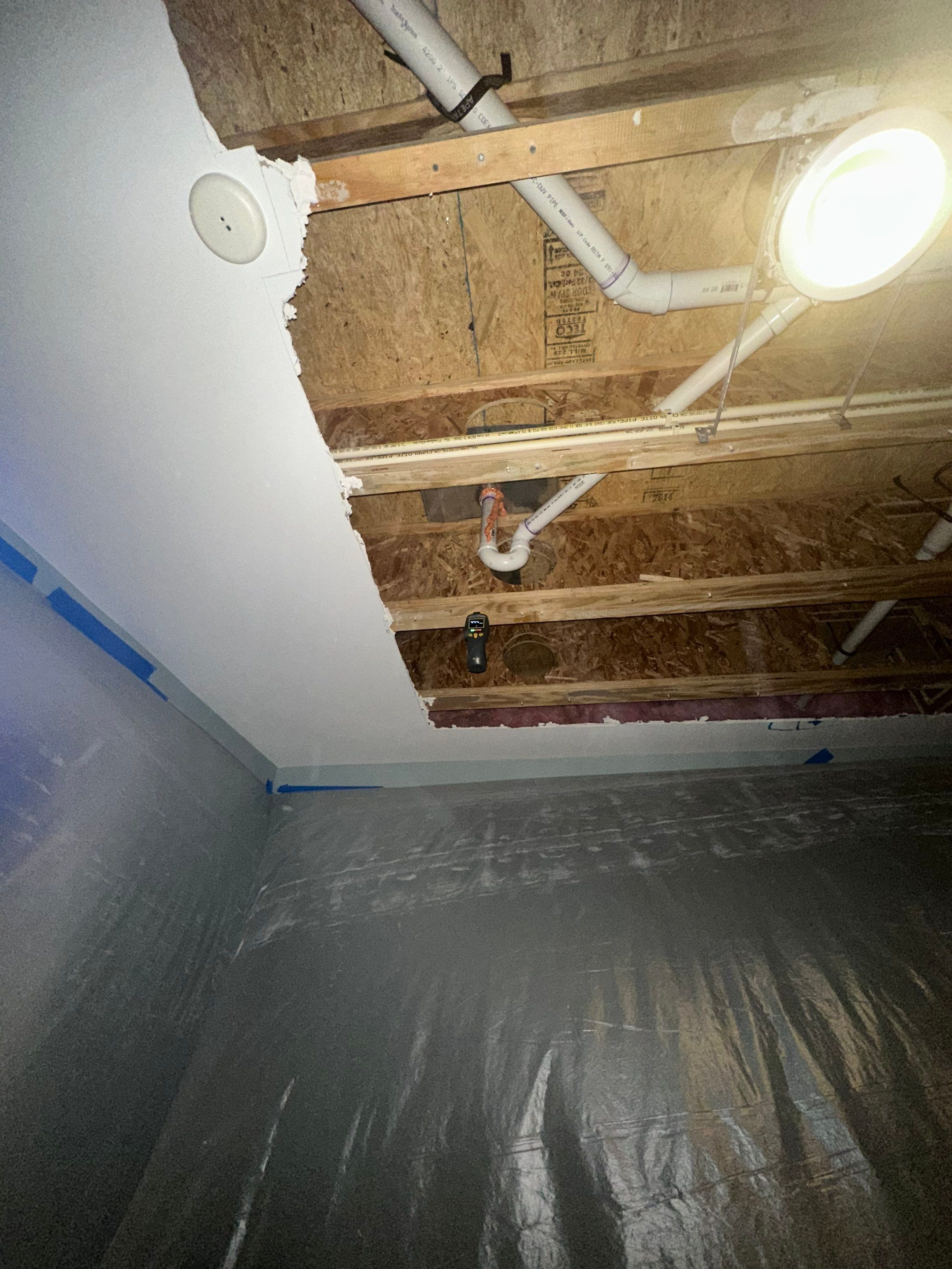 Dehumidification equipment positioned for structural drying during mold remediation.