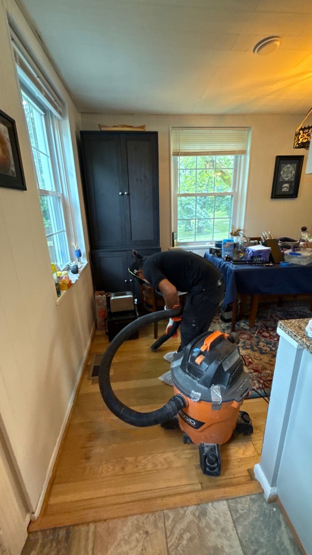Dehumidifiers and air movers running during mold remediation drying phase in Arlington home.