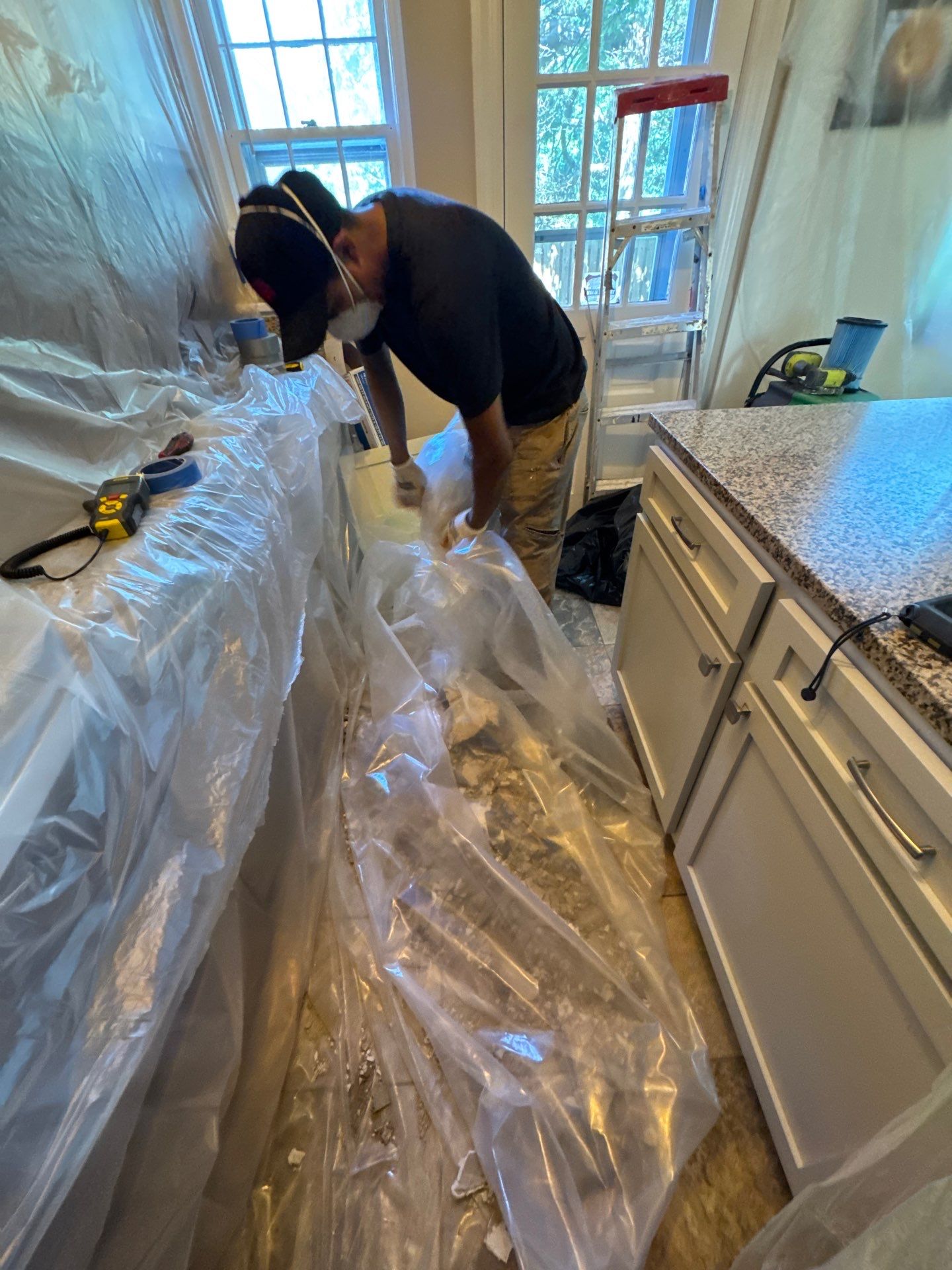 Ceiling damage assessment and prep for repair during Arlington mold remediation sequence.