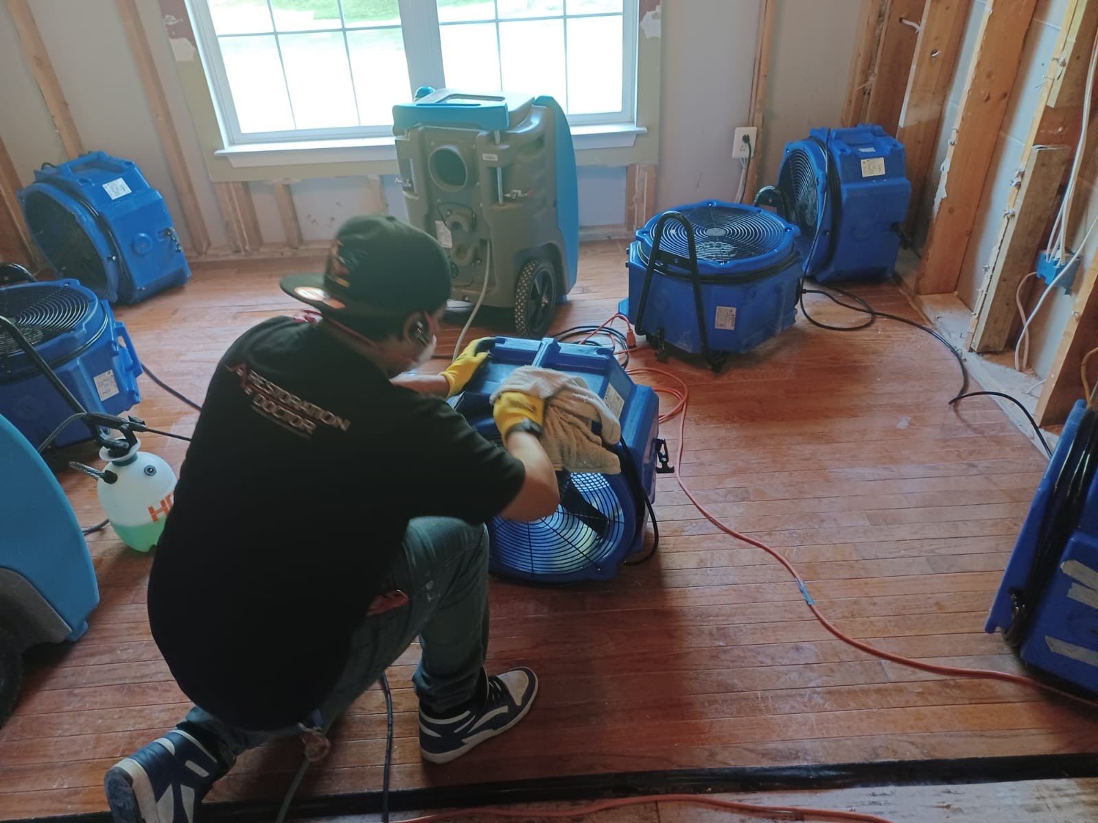 Mold remediation containment setup during structural drying phase of water damage restoration.