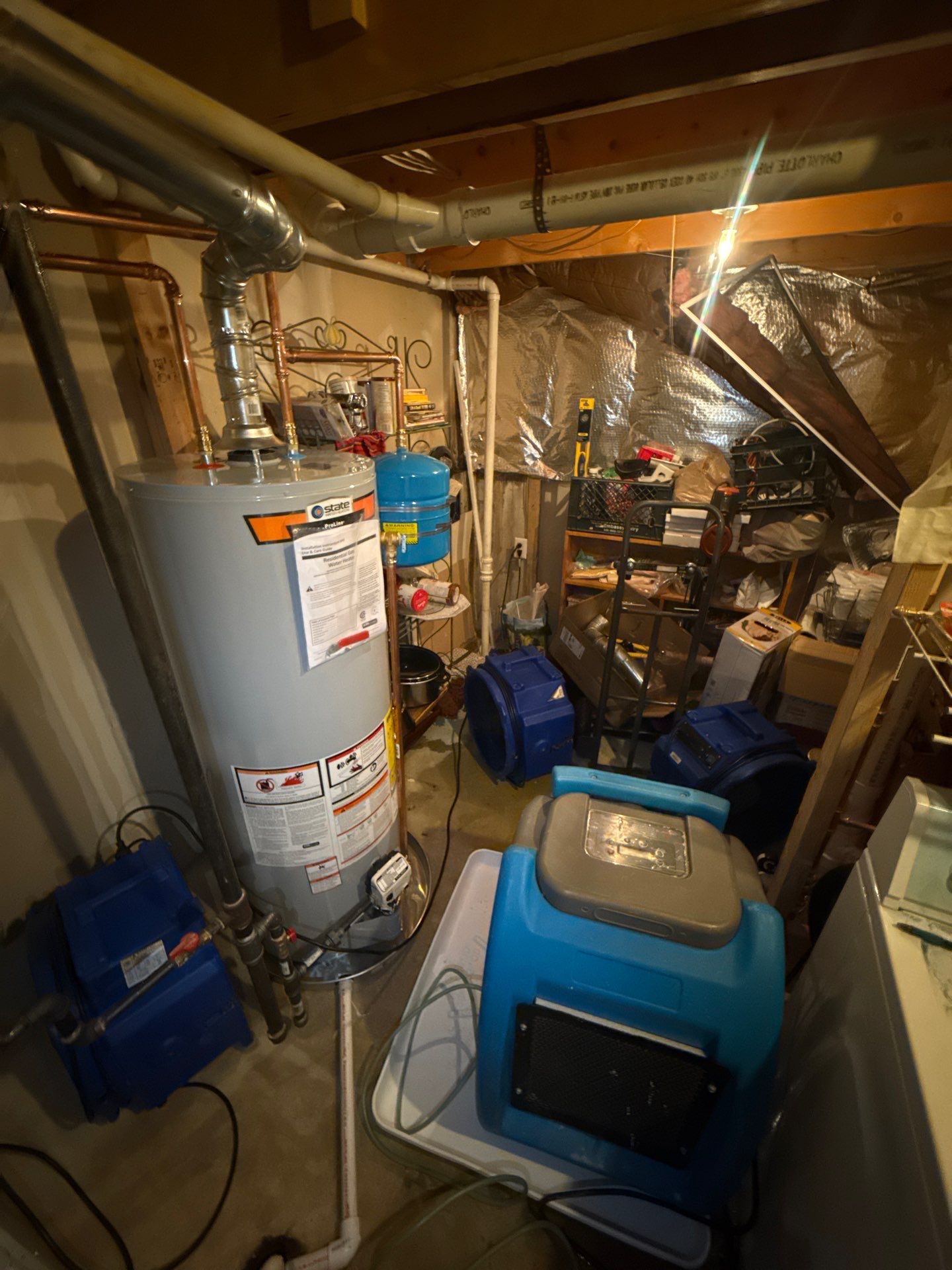 Initial mold remediation assessment in Franconia showing affected flooring and structural areas requiring drying and removal.