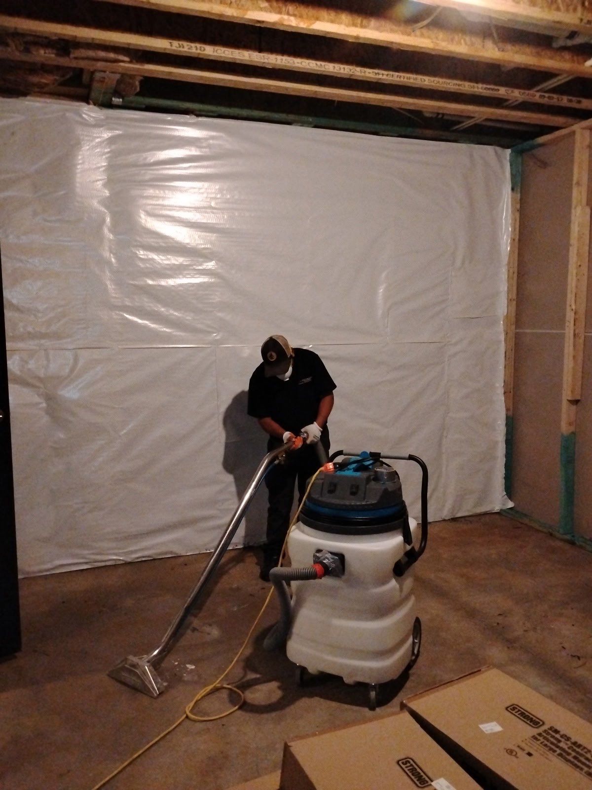Ashburn water damage restoration showing prepared substrate after drying phase, ready for wall and flooring replacement.