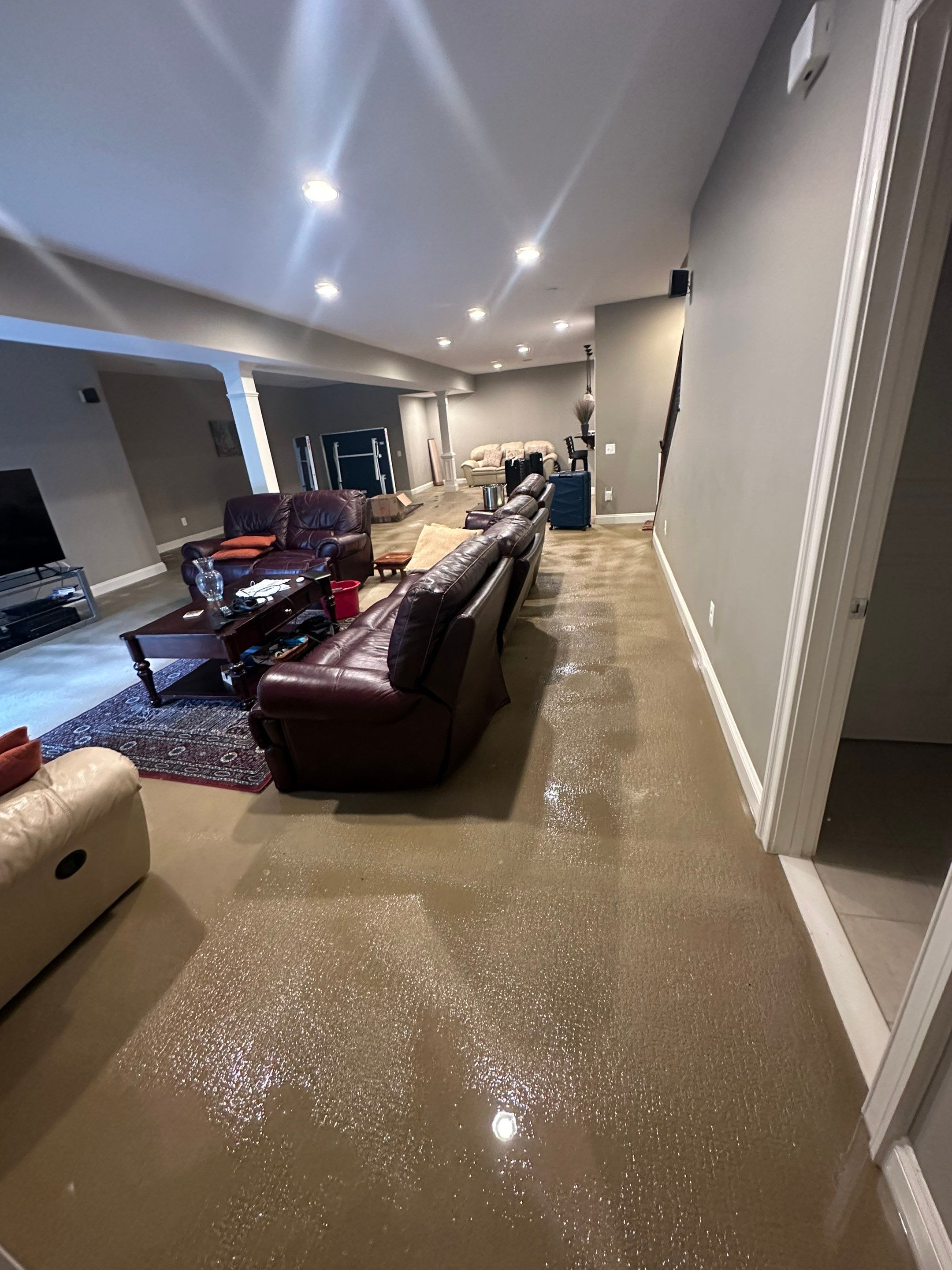 Final inspection of dried surfaces confirming water damage restoration completion in Centreville.