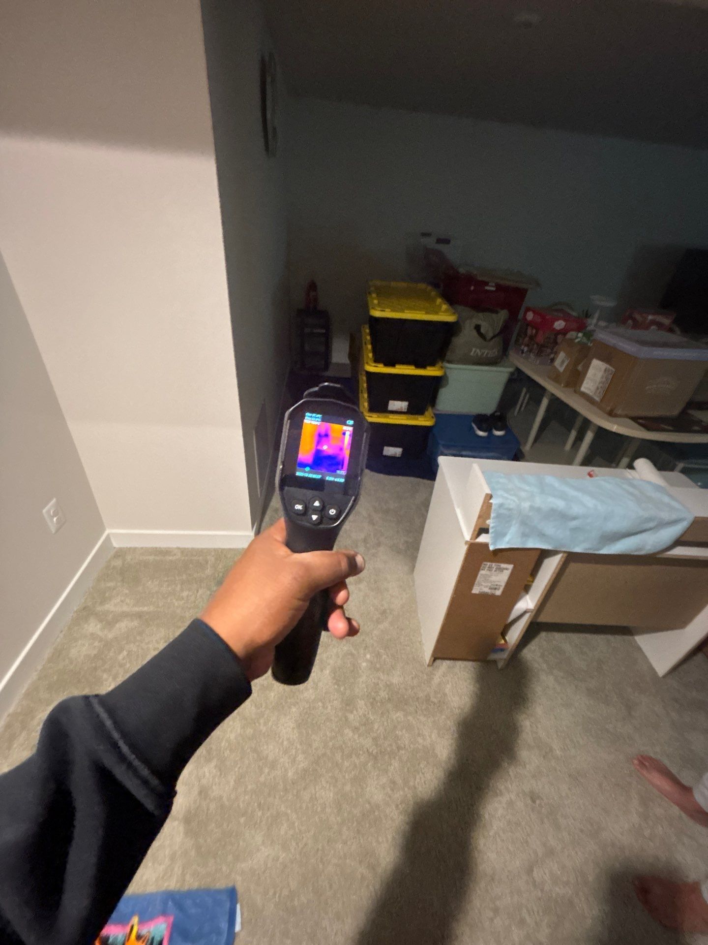 Moisture inspection underway during water damage remediation in Stafford flooring area.