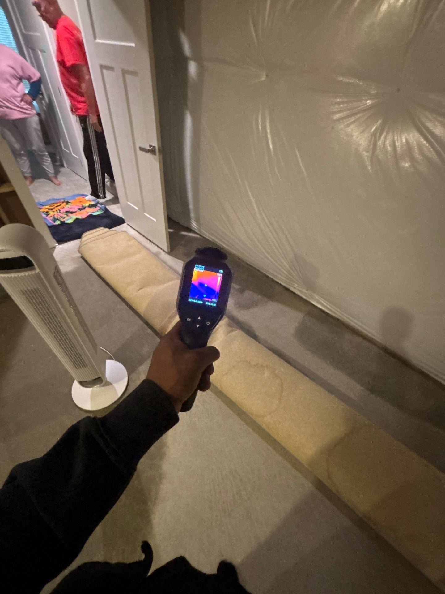 Thermal imaging documentation of drying progress on affected carpet and subfloor.
