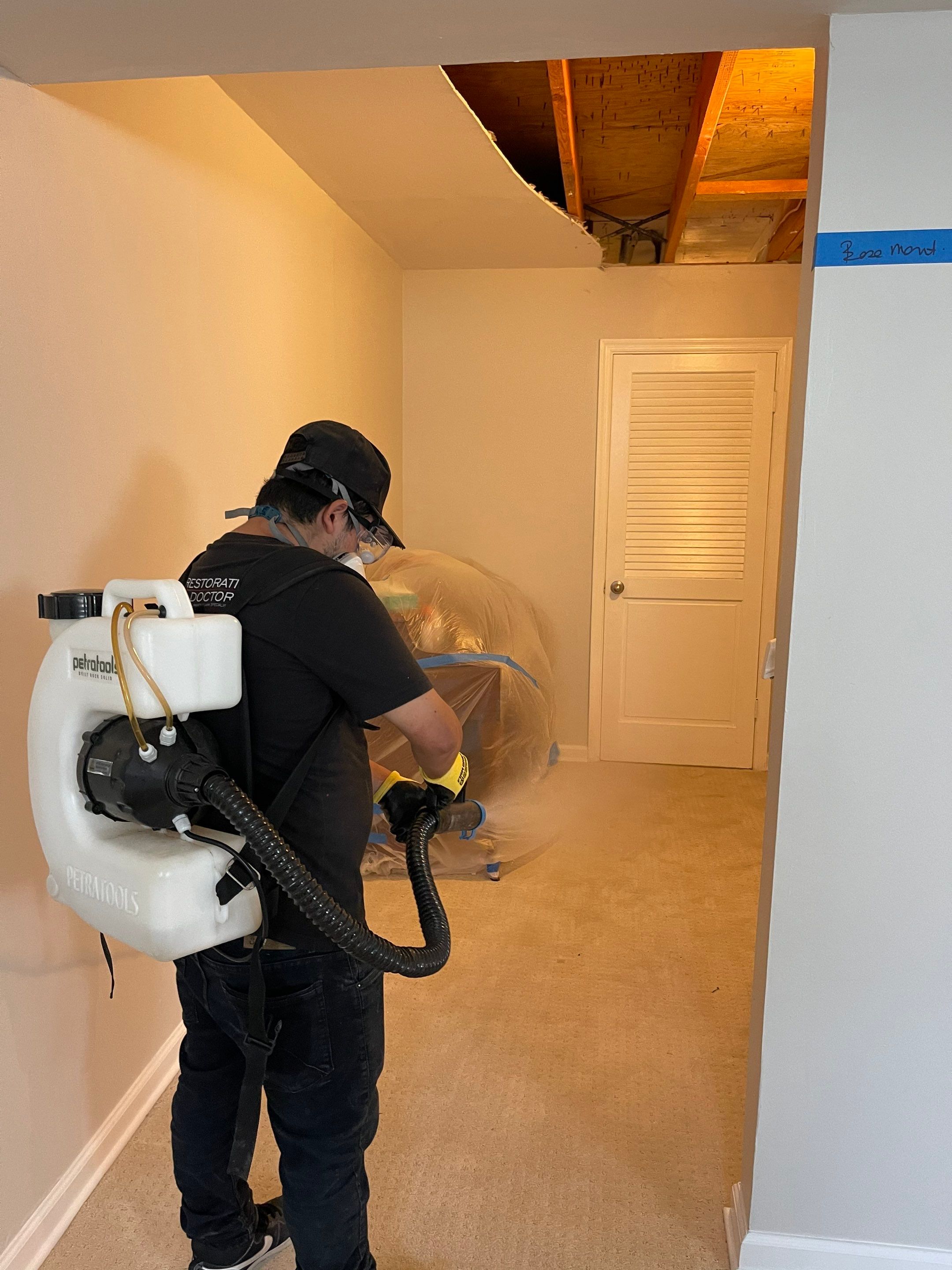 Mid-stage drying setup showing continued dehumidification and air circulation in Vienna restoration.