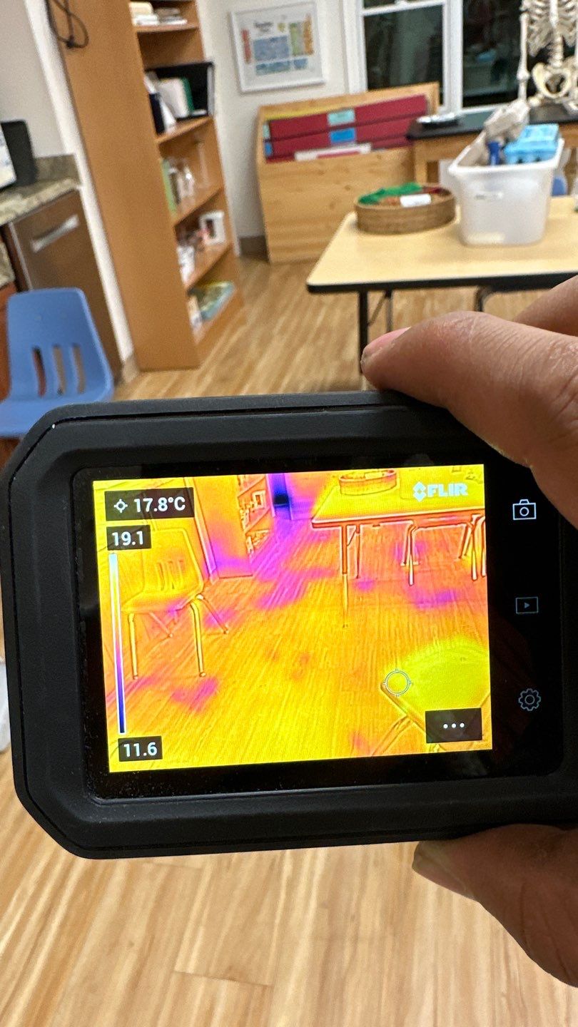 Mid-stage drying progress showing reduced moisture levels from thermal imaging comparison.