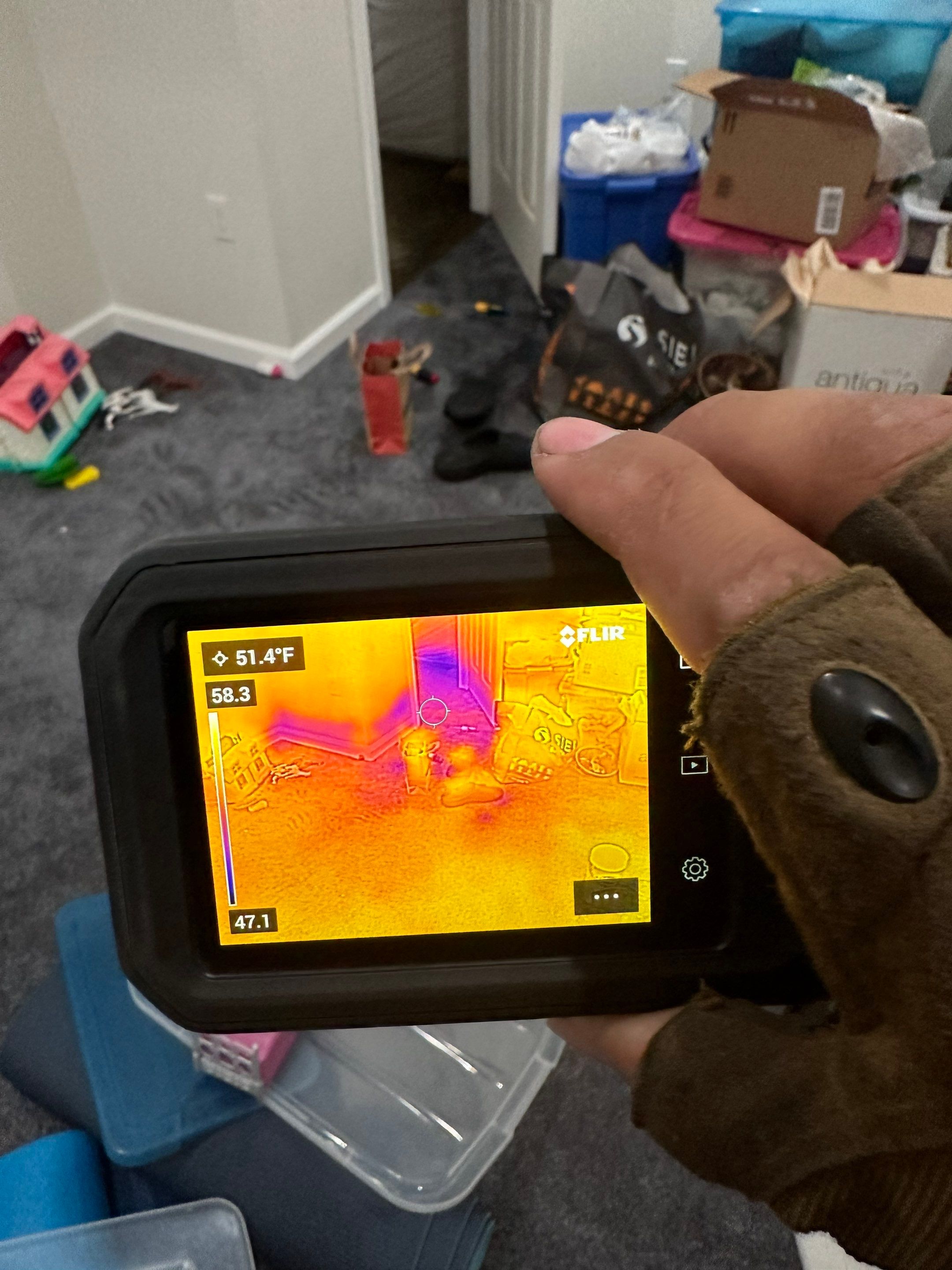 Moisture mapping documents drying progress across structural materials in active restoration.