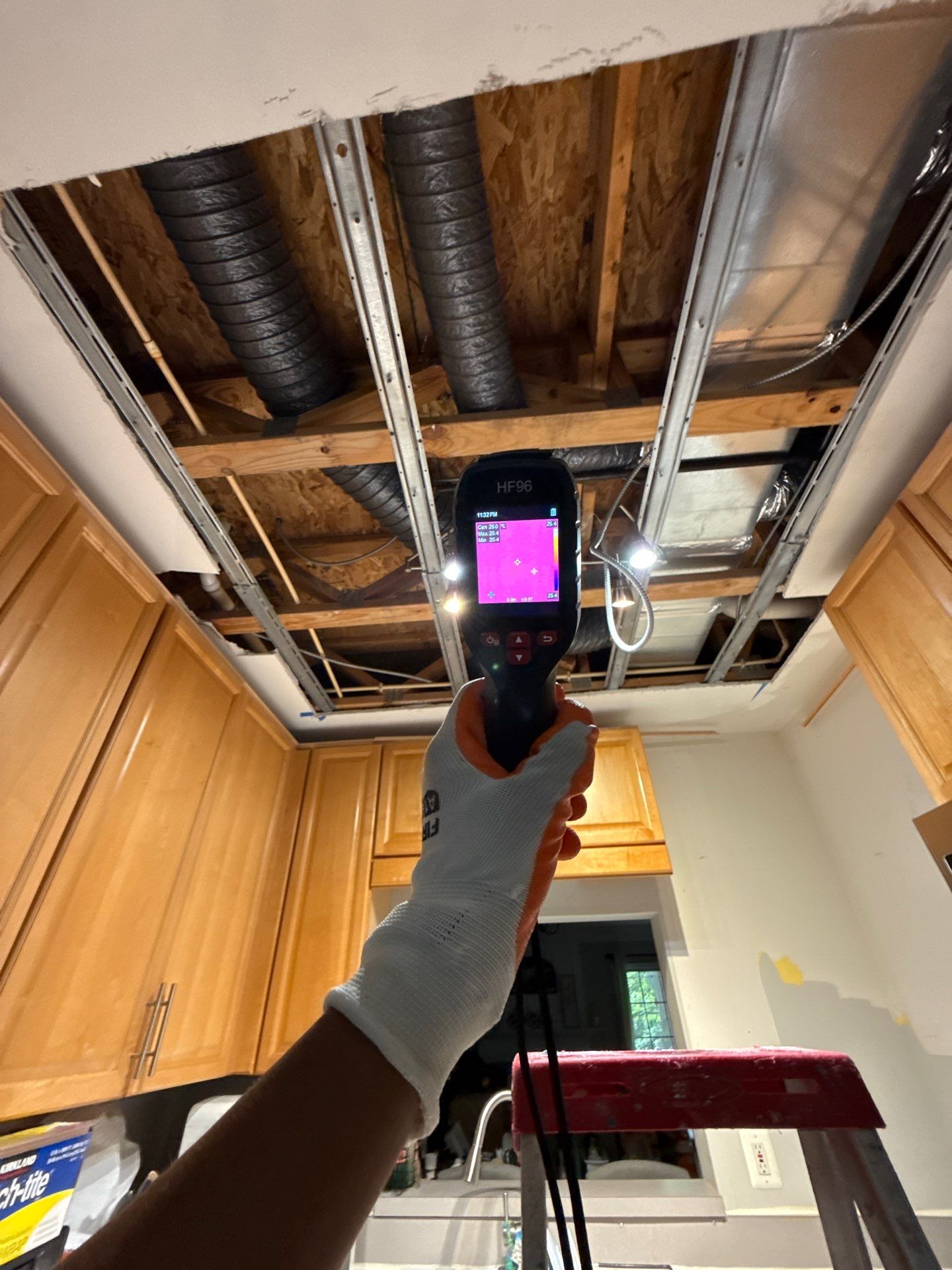 Mid-stage drying documentation showing moisture removal equipment positioning.