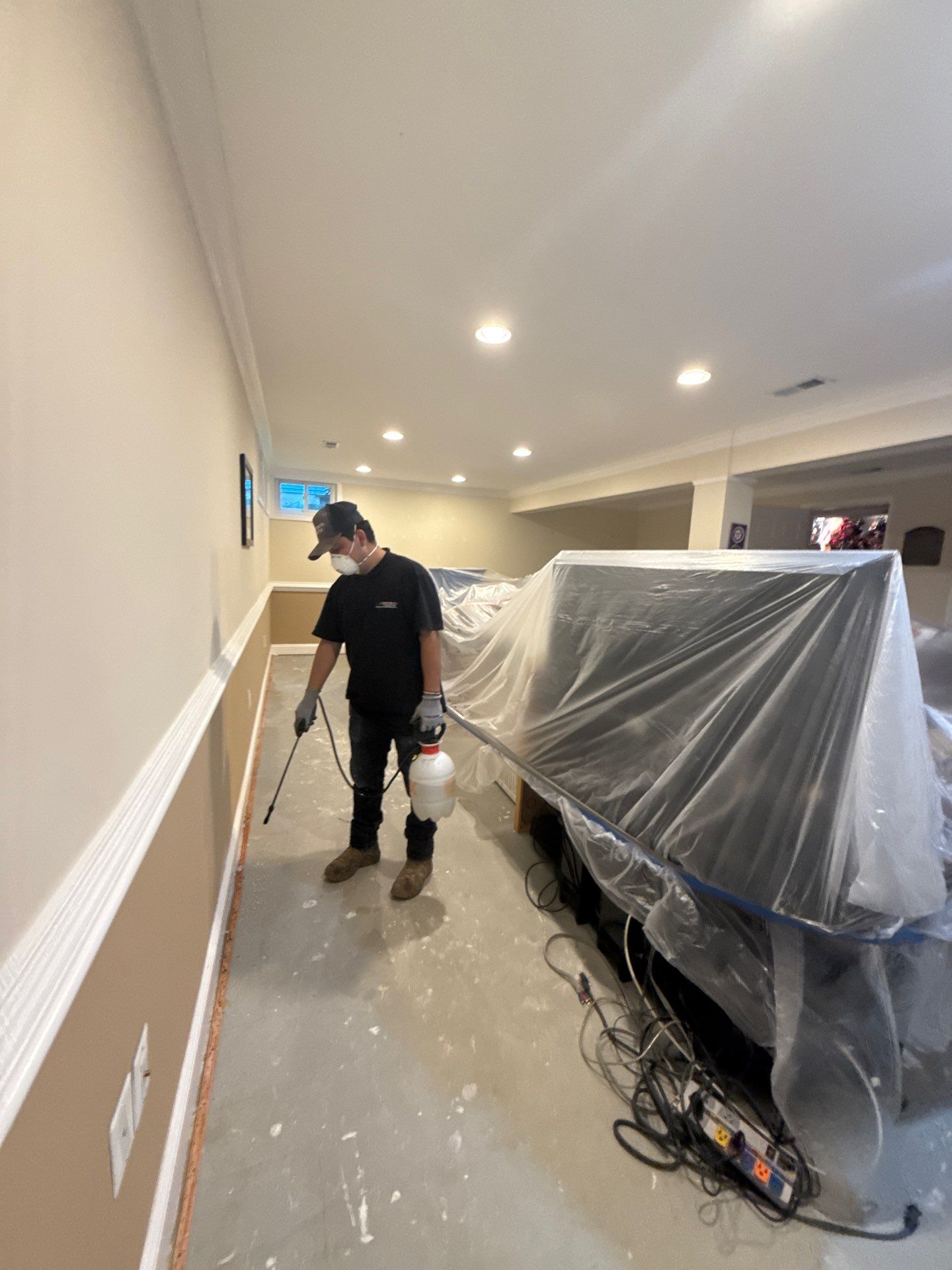 Dried framing and new baseboard installation completing mold remediation in Centreville.