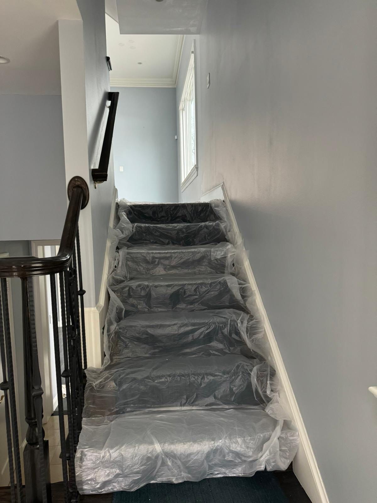 Final-stage water damage restoration in Alexandria with ceiling repair completed and drying phase concluded.