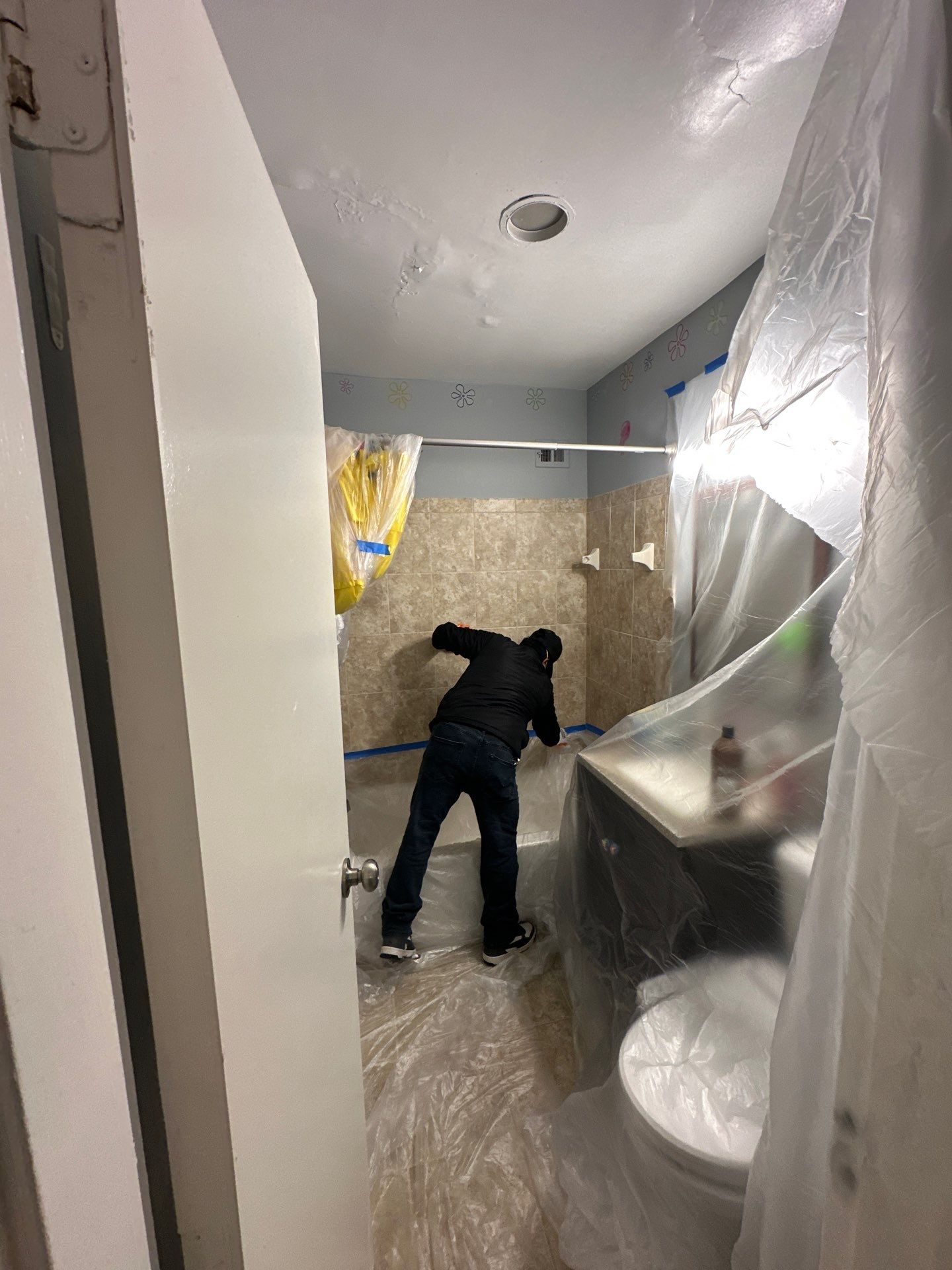 Repaired ceiling drywall reinstalled following mold remediation and moisture remediation in Alexandria.