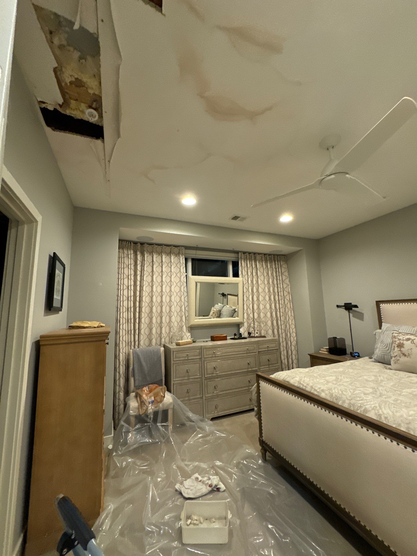 Completed ceiling repair, final drying verification in restored Fairfax home.