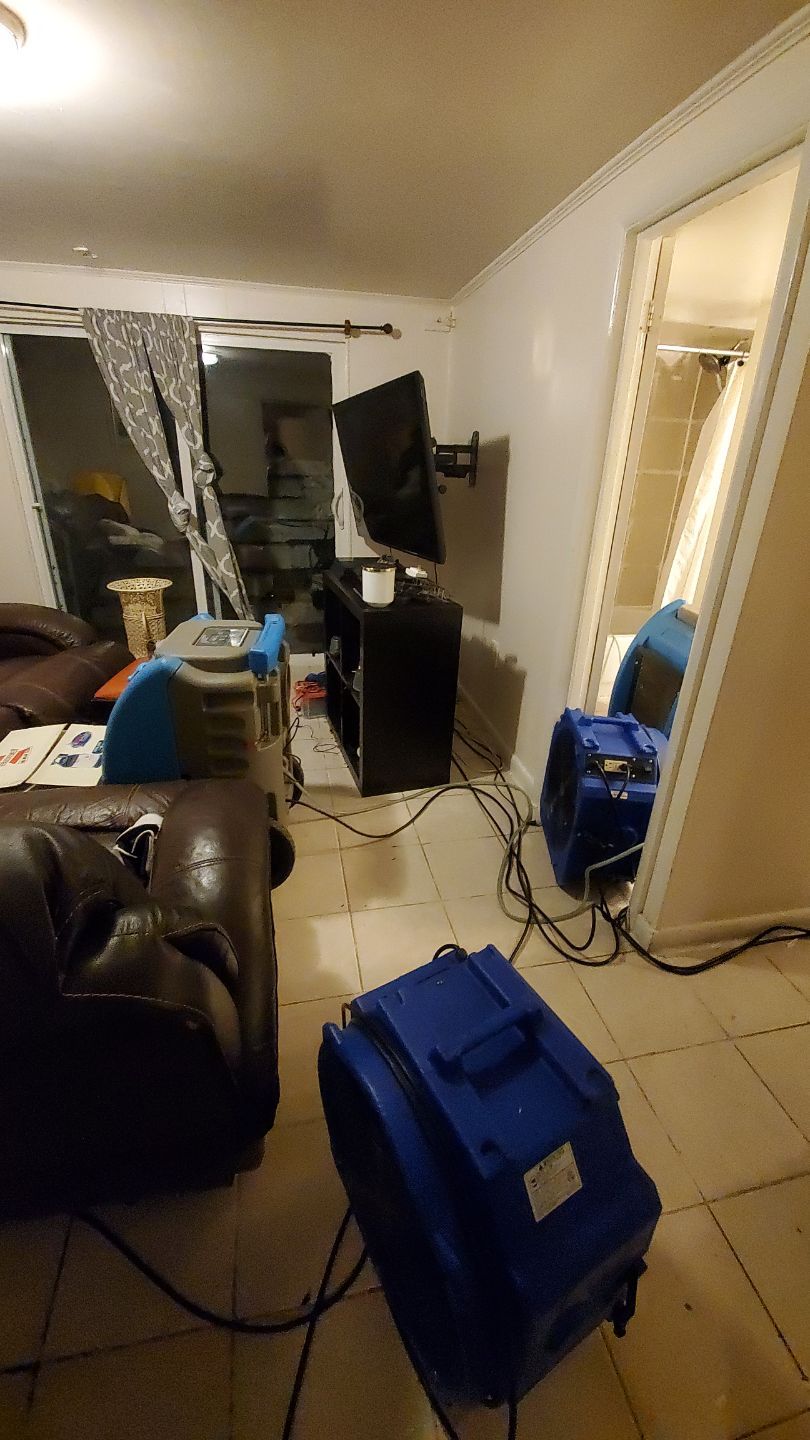 Dehumidification equipment deployed across affected area during structural drying phase.