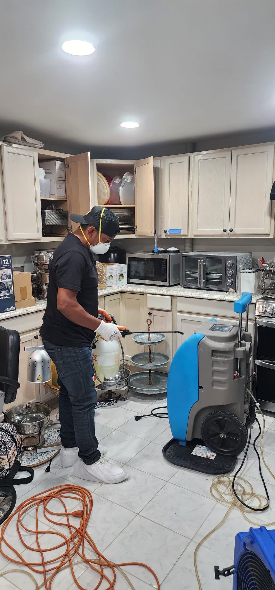 Final-stage drying verification showing cleared surfaces and equipment removal after water damage restoration completion.