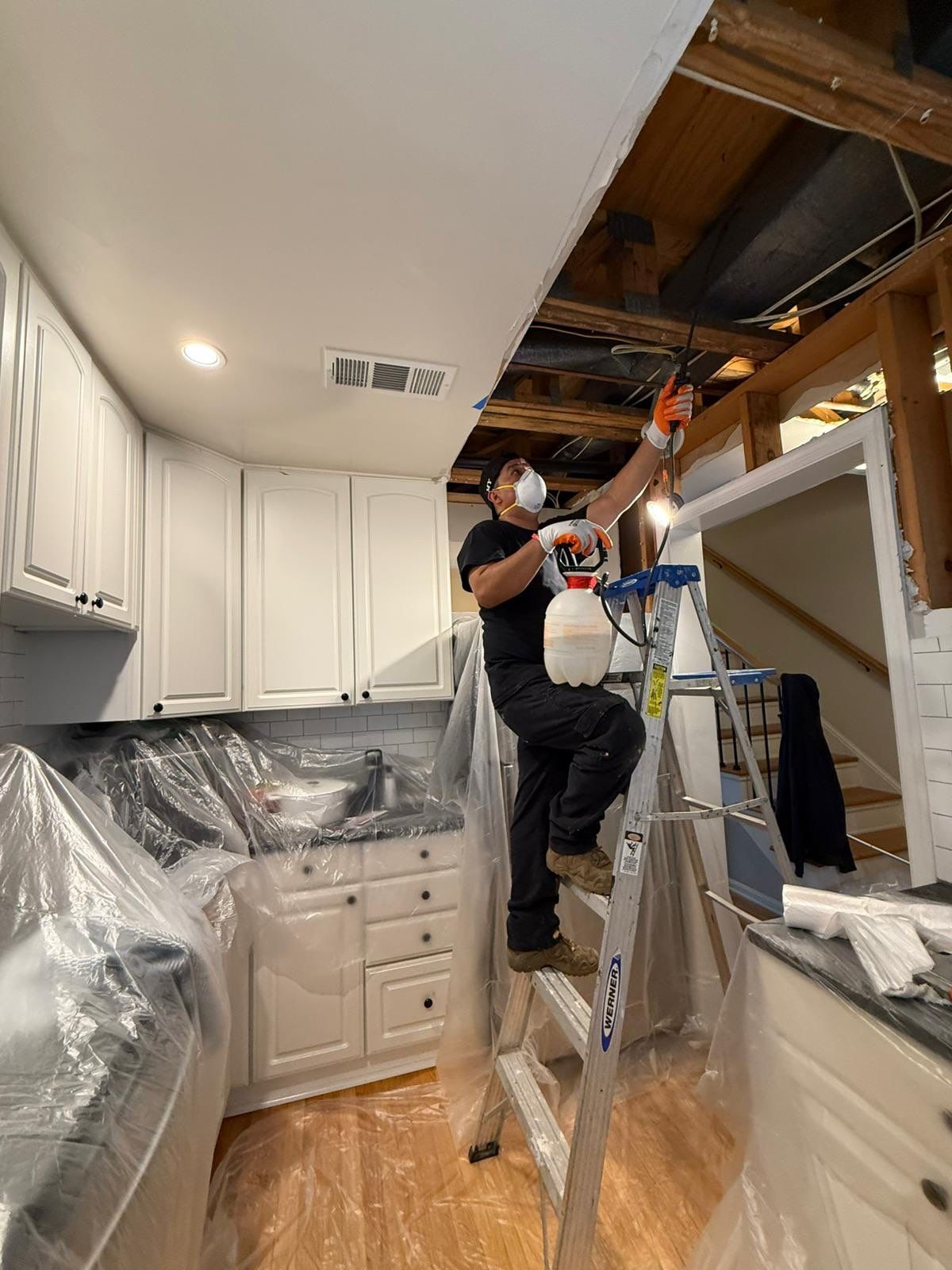 Finished wall installation concluding Arlington water damage restoration and structural drying work.