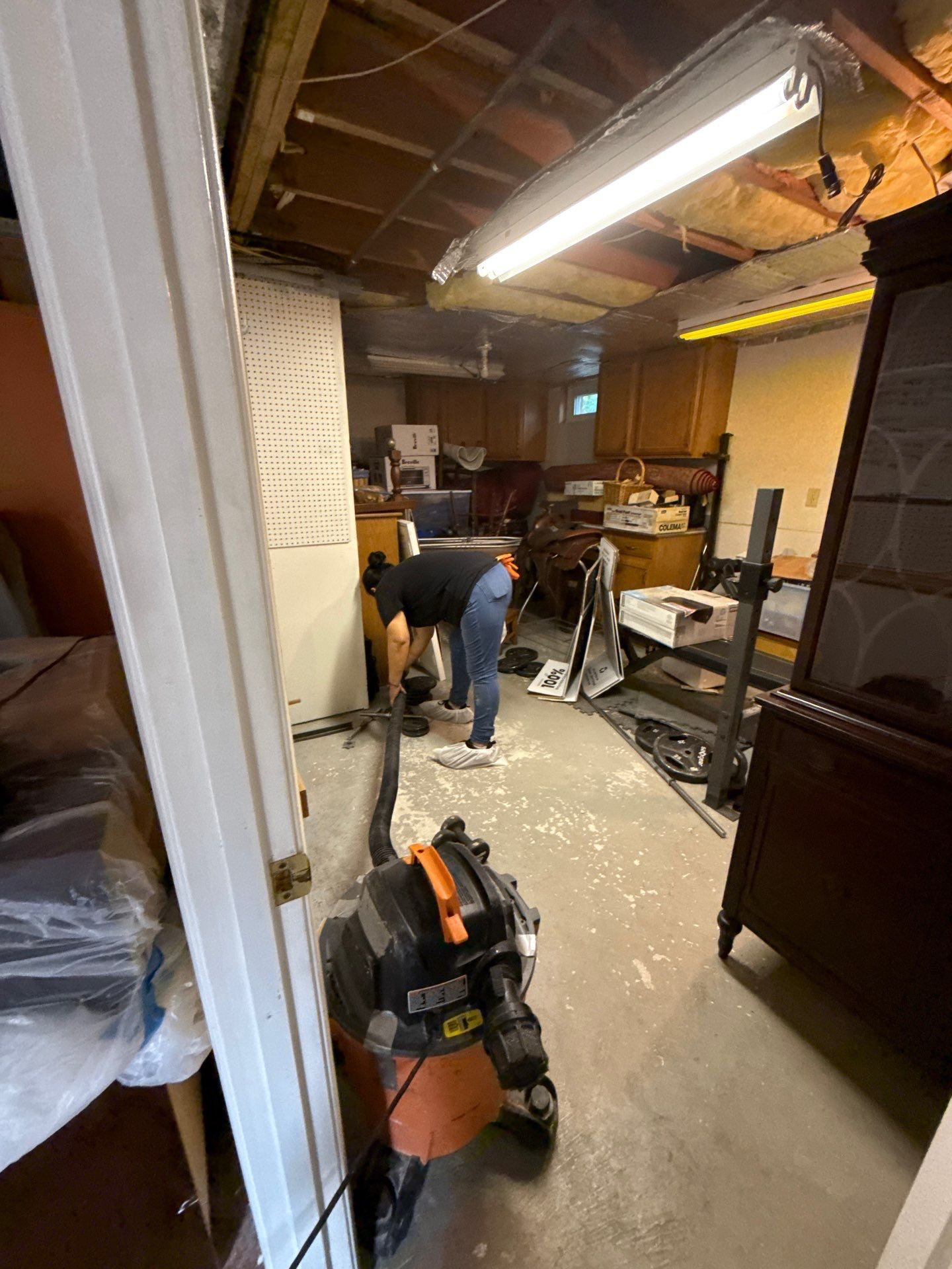 Structural drying in progress, monitoring moisture removal from building materials.