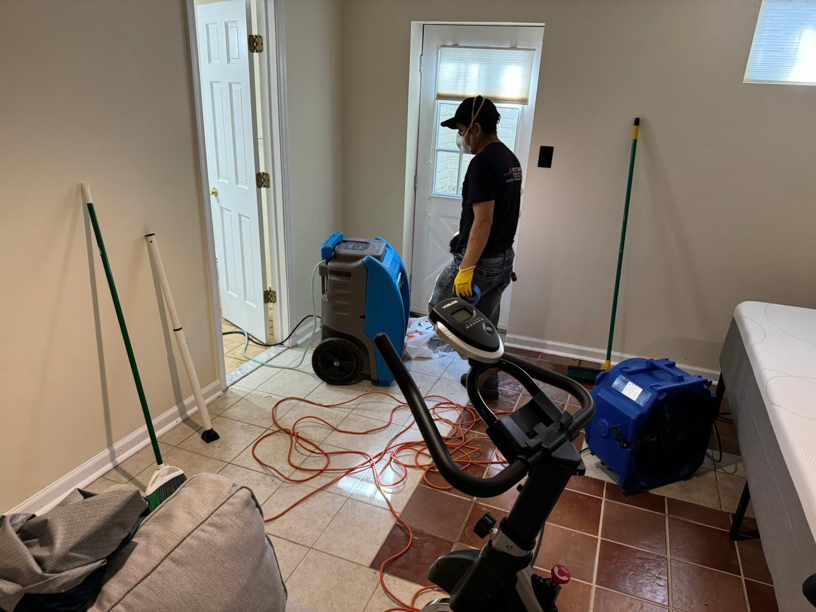 Water extraction and dehumidification equipment deployed during initial assessment in Springfield water damage restoration.