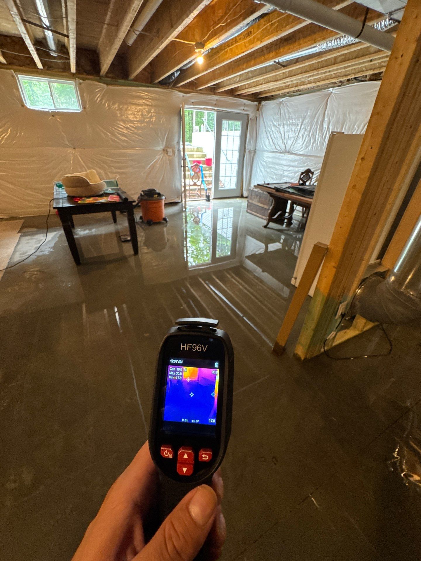 Infrared scan documents moisture patterns as drying progresses in Fredericksburg restoration.