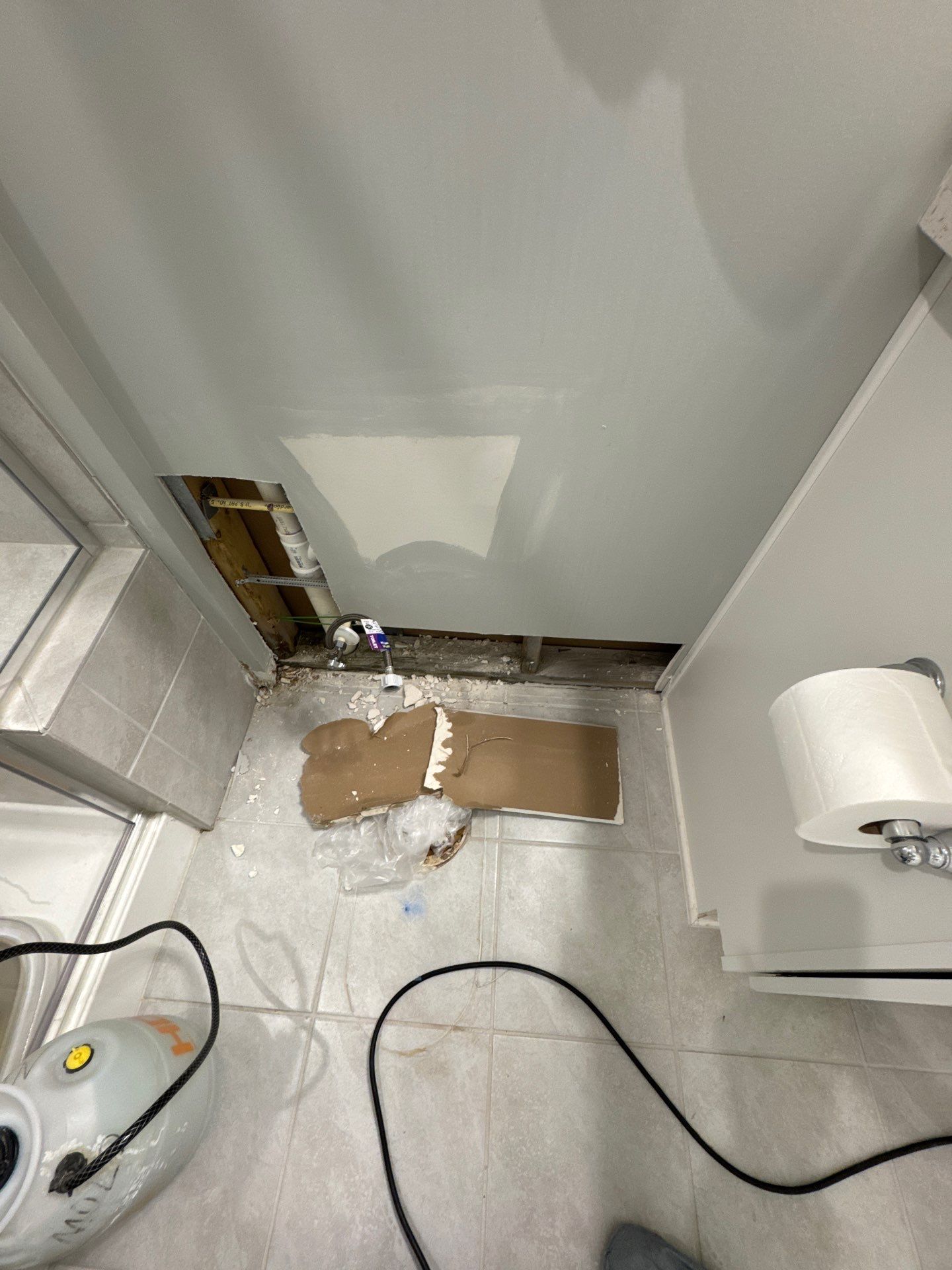 Structural drying equipment positioned within containment during Sterling water restoration work.