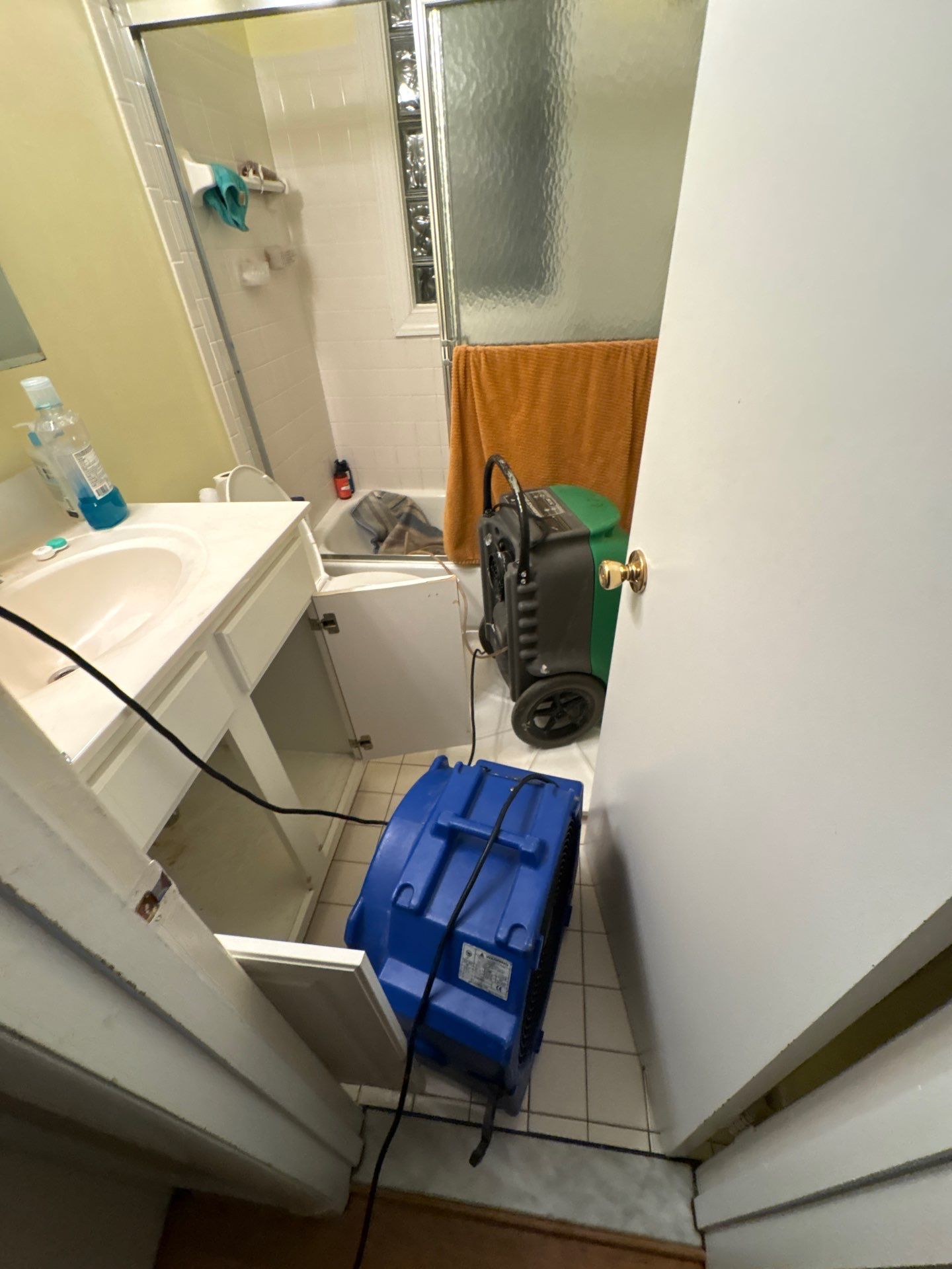 Final-stage Vienna water damage restoration, structural drying complete and equipment removal underway.